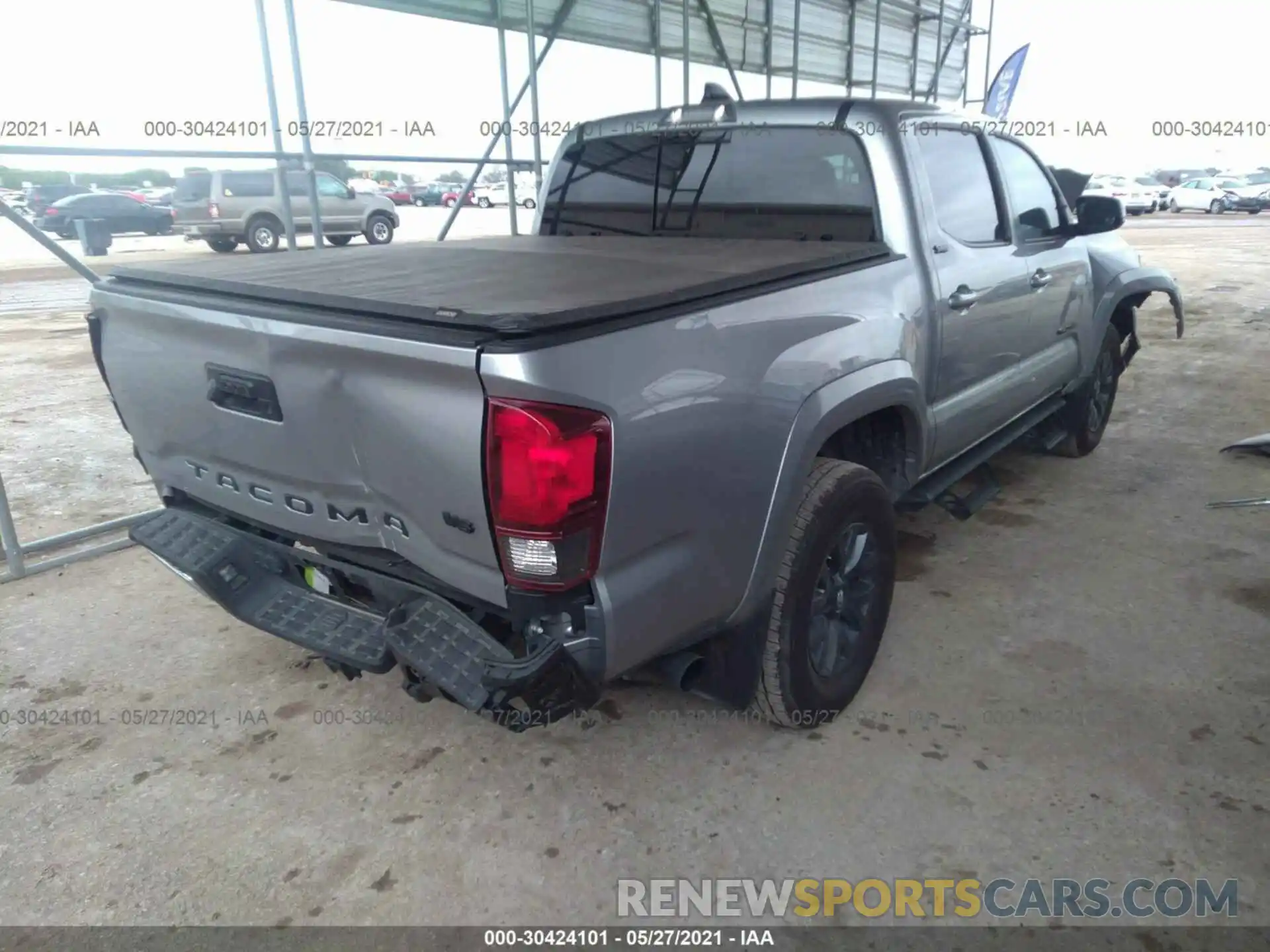 4 Photograph of a damaged car 5TFAZ5CN5MX097773 TOYOTA TACOMA 2WD 2021