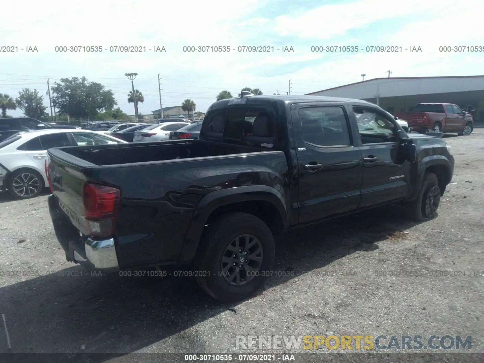 4 Photograph of a damaged car 5TFAZ5CN5MX102566 TOYOTA TACOMA 2WD 2021