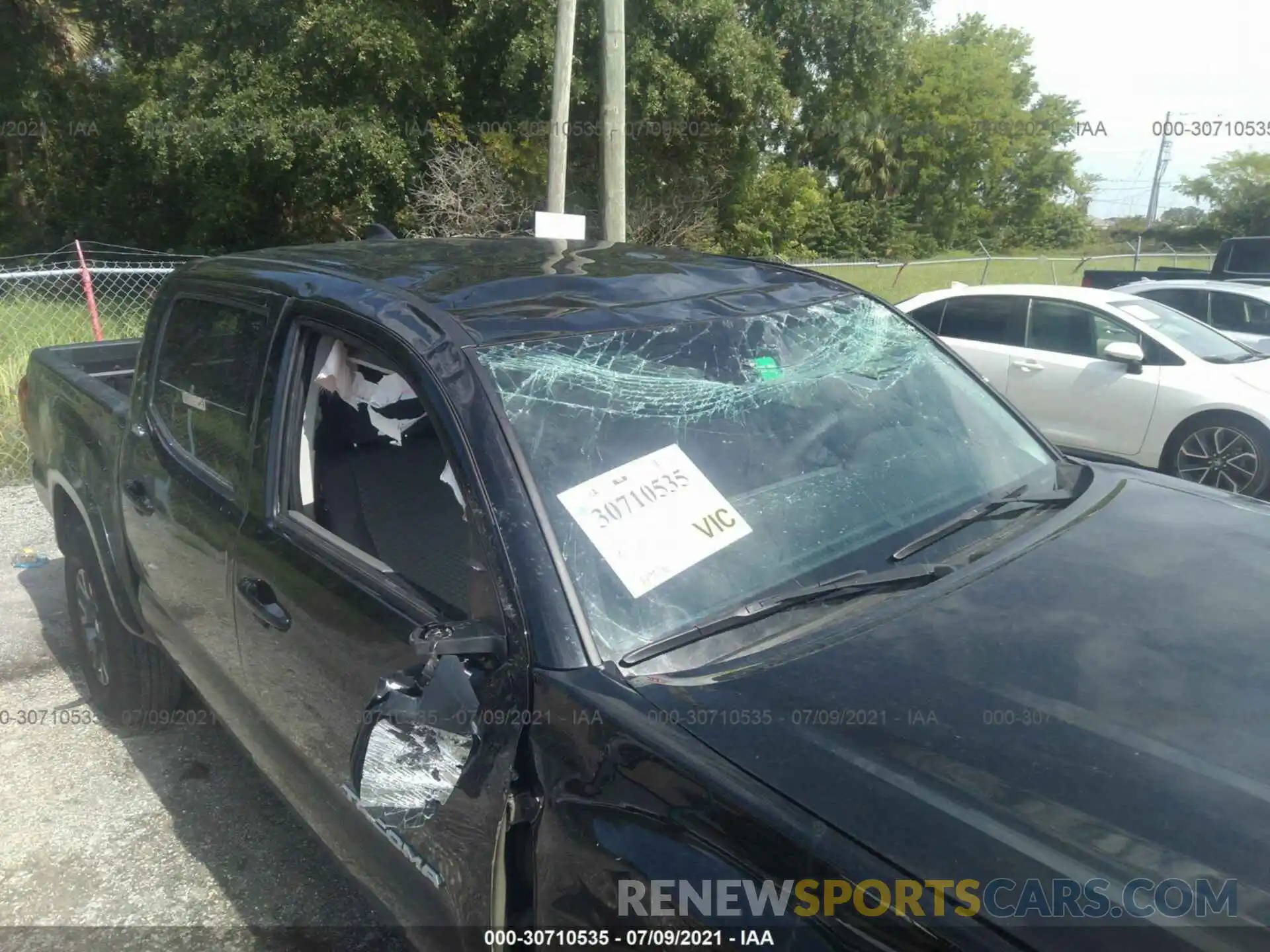 6 Photograph of a damaged car 5TFAZ5CN5MX102566 TOYOTA TACOMA 2WD 2021