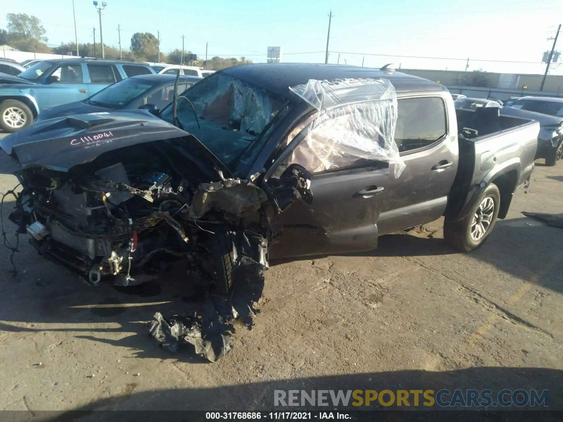 2 Photograph of a damaged car 5TFAZ5CN5MX111137 TOYOTA TACOMA 2WD 2021