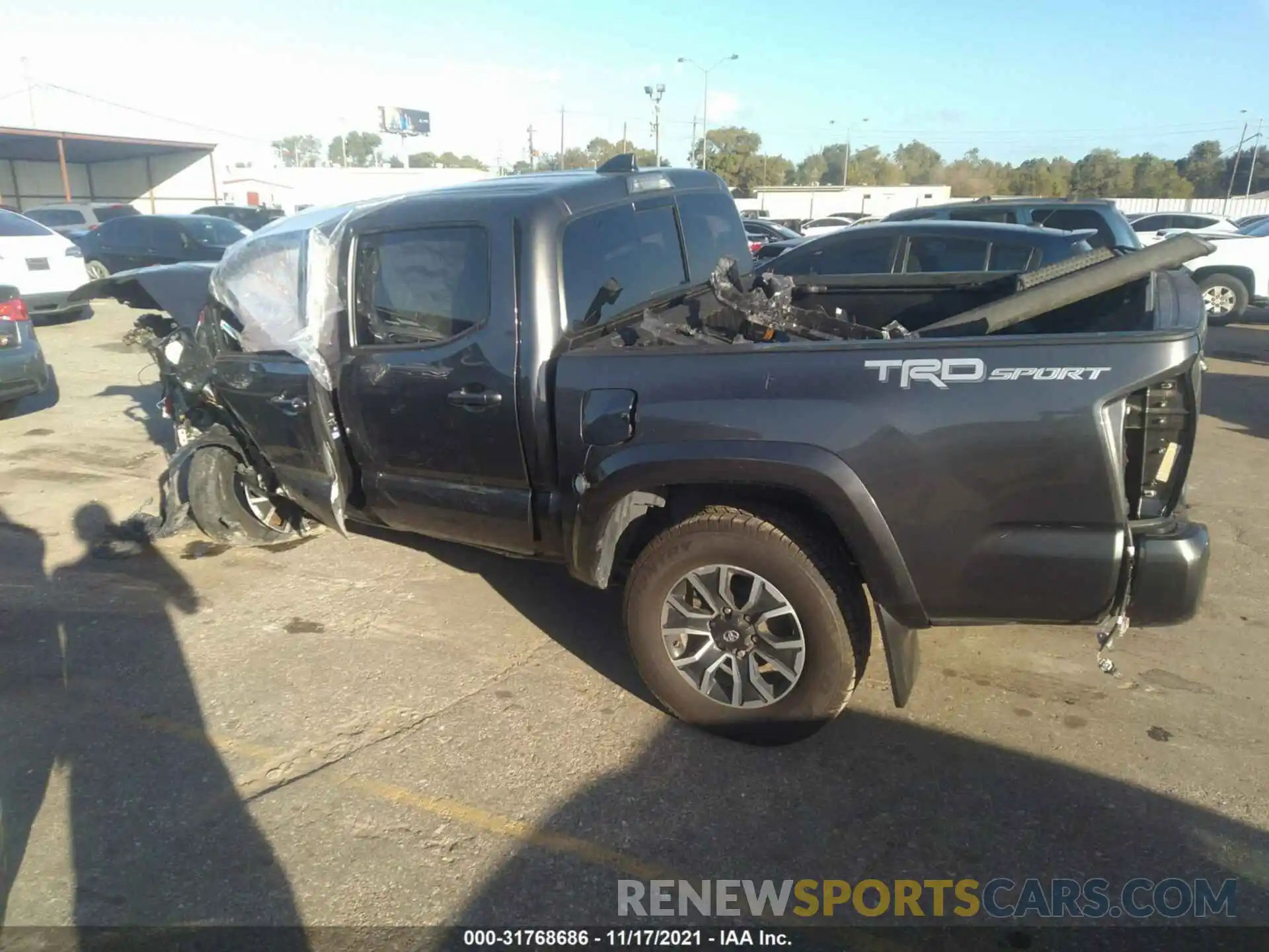 3 Photograph of a damaged car 5TFAZ5CN5MX111137 TOYOTA TACOMA 2WD 2021