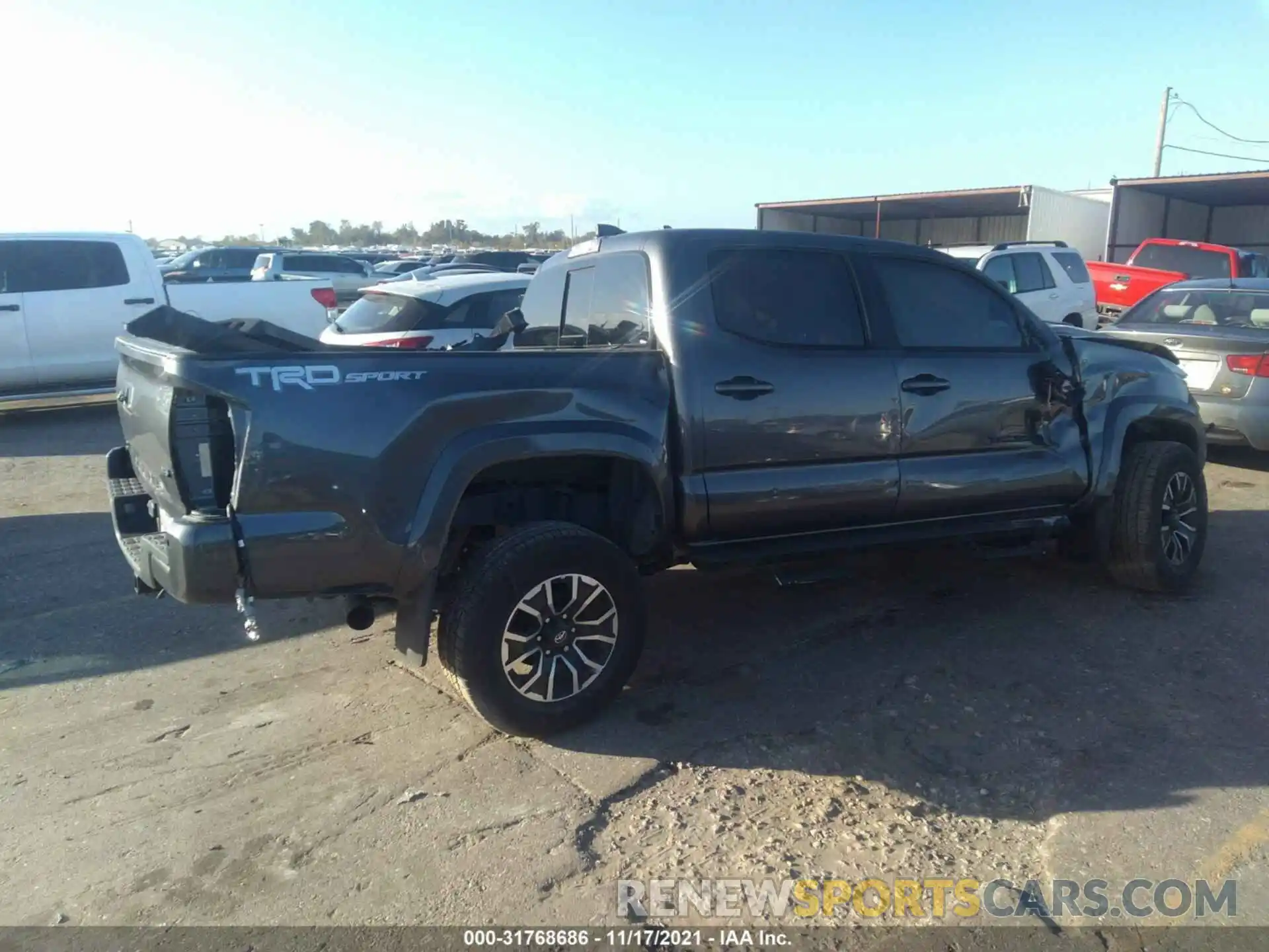 4 Photograph of a damaged car 5TFAZ5CN5MX111137 TOYOTA TACOMA 2WD 2021