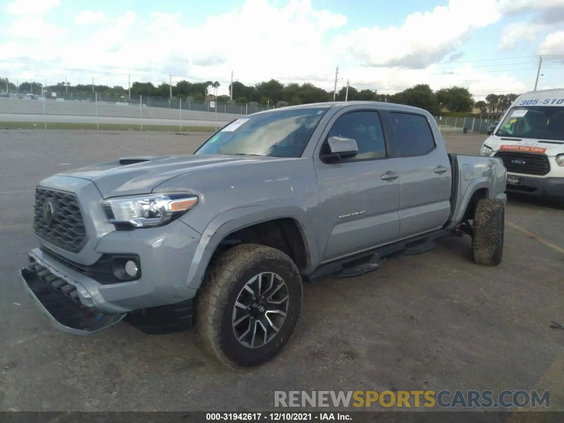 2 Photograph of a damaged car 5TFAZ5CN6MX096051 TOYOTA TACOMA 2WD 2021