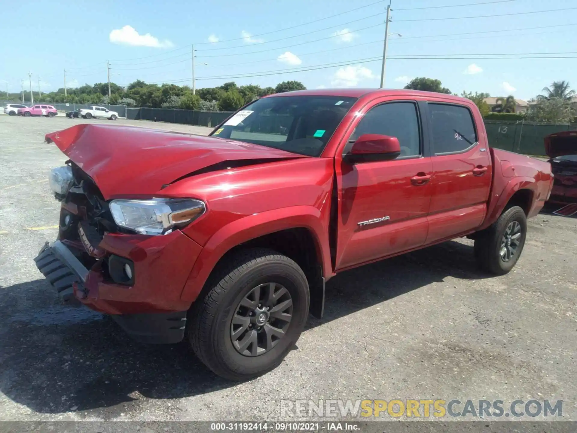 2 Photograph of a damaged car 5TFAZ5CN6MX100468 TOYOTA TACOMA 2WD 2021