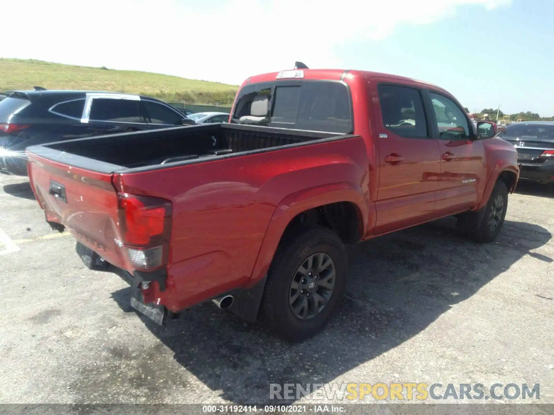 4 Photograph of a damaged car 5TFAZ5CN6MX100468 TOYOTA TACOMA 2WD 2021