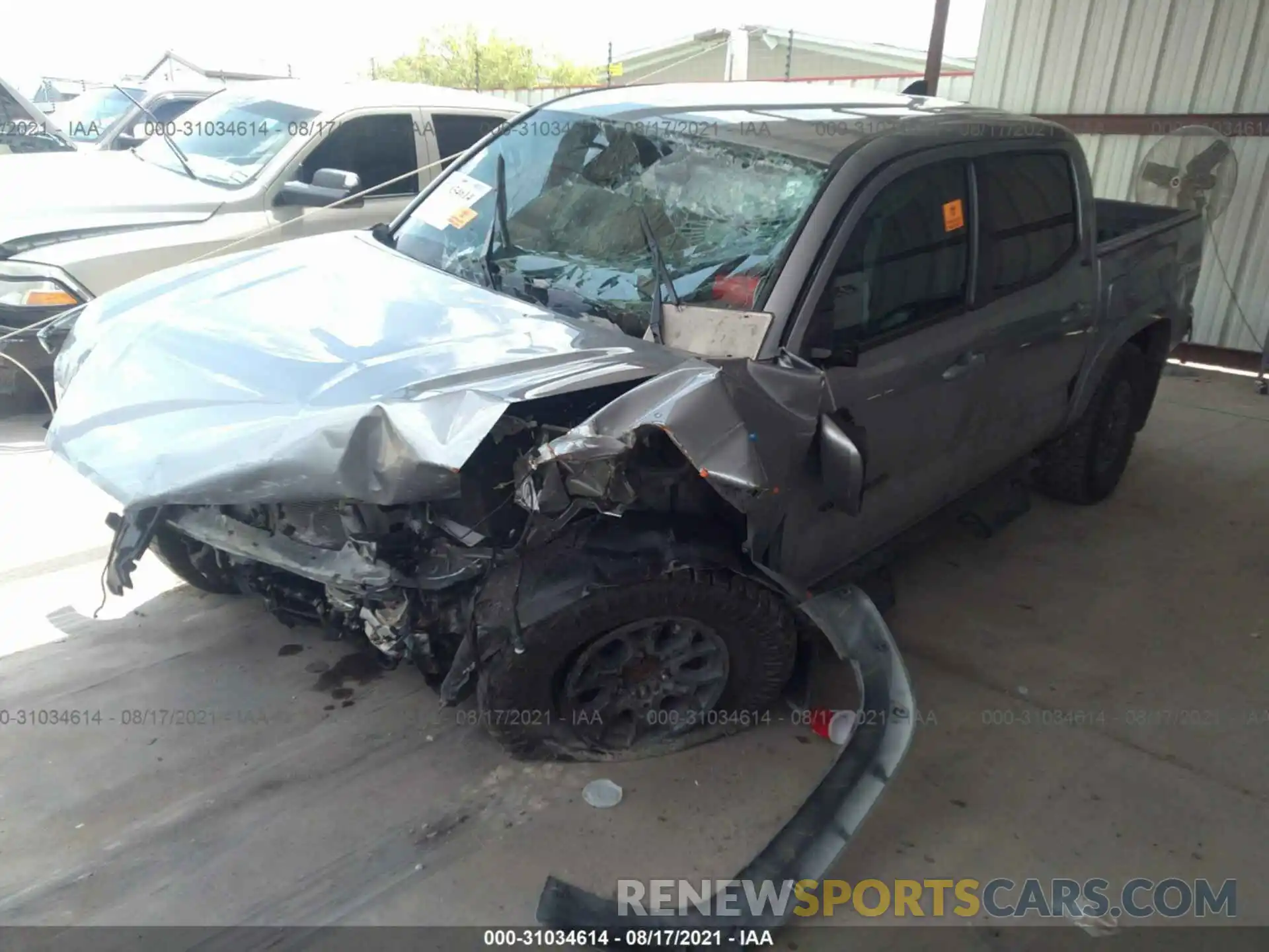 2 Photograph of a damaged car 5TFAZ5CN6MX105735 TOYOTA TACOMA 2WD 2021