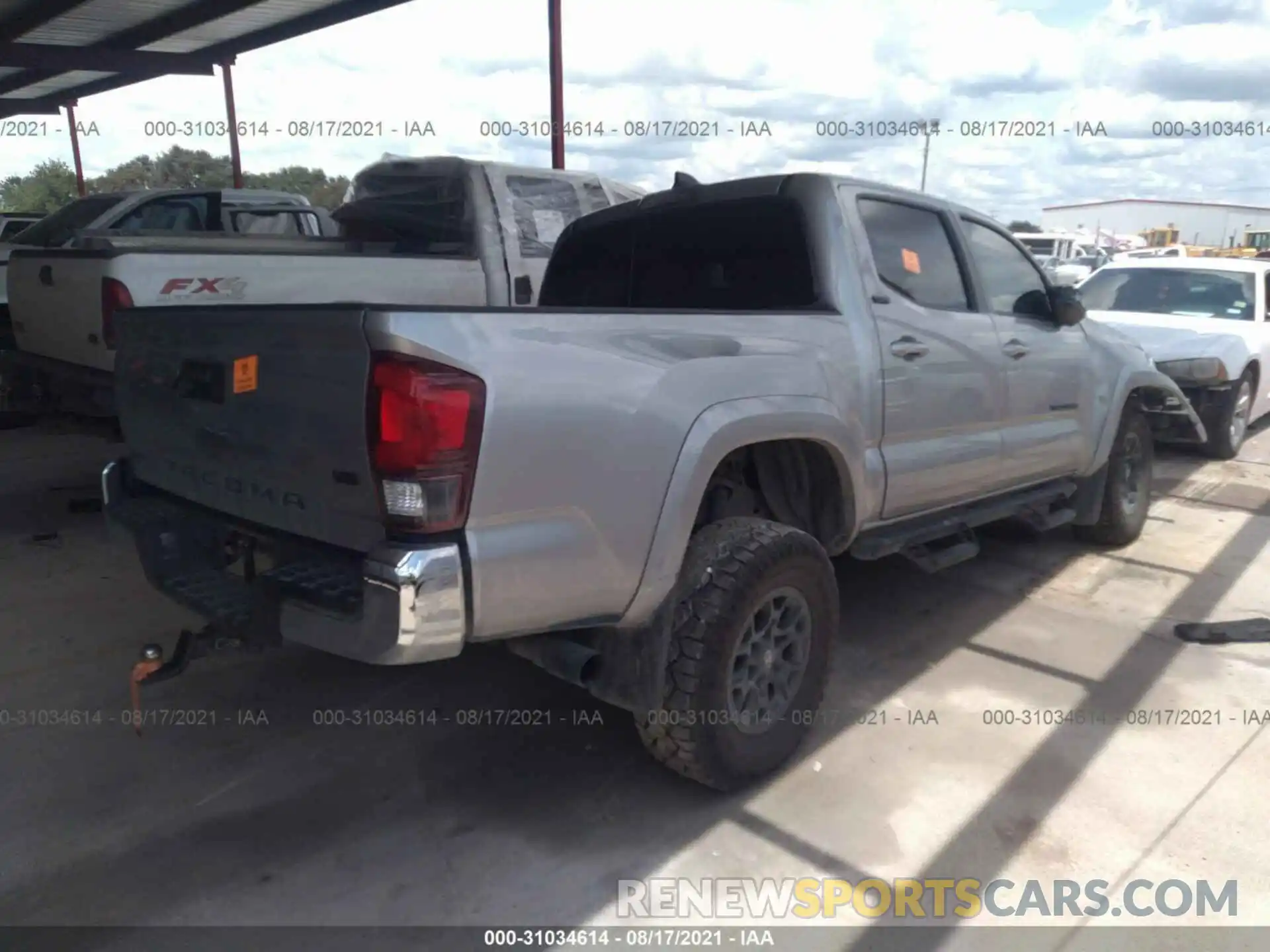 4 Photograph of a damaged car 5TFAZ5CN6MX105735 TOYOTA TACOMA 2WD 2021