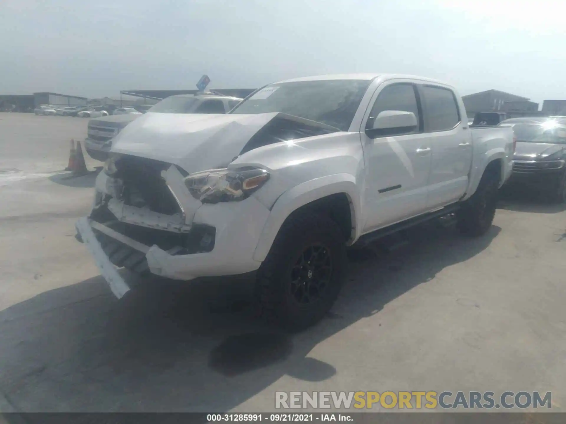 2 Photograph of a damaged car 5TFAZ5CN6MX108683 TOYOTA TACOMA 2WD 2021