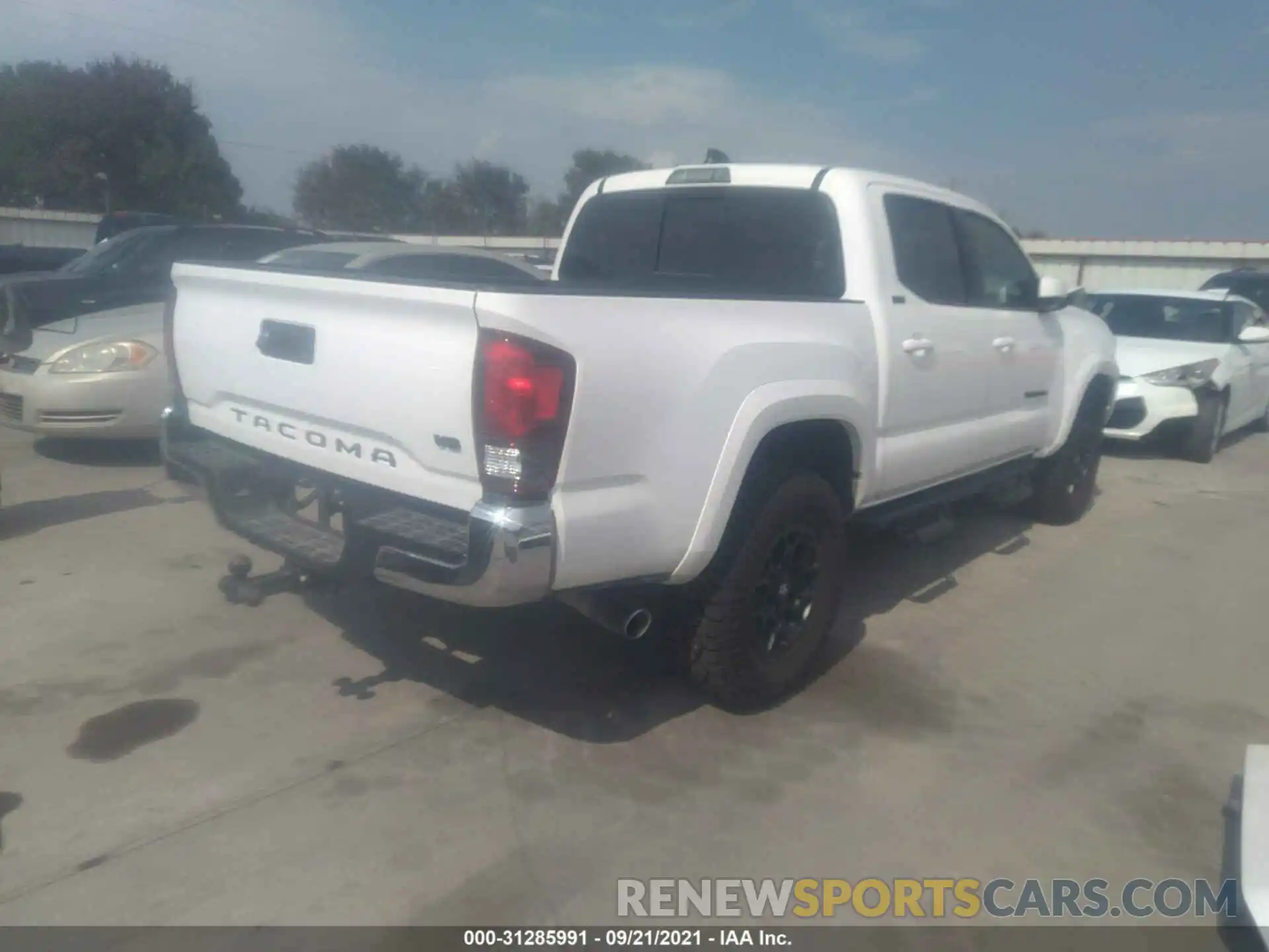 4 Photograph of a damaged car 5TFAZ5CN6MX108683 TOYOTA TACOMA 2WD 2021