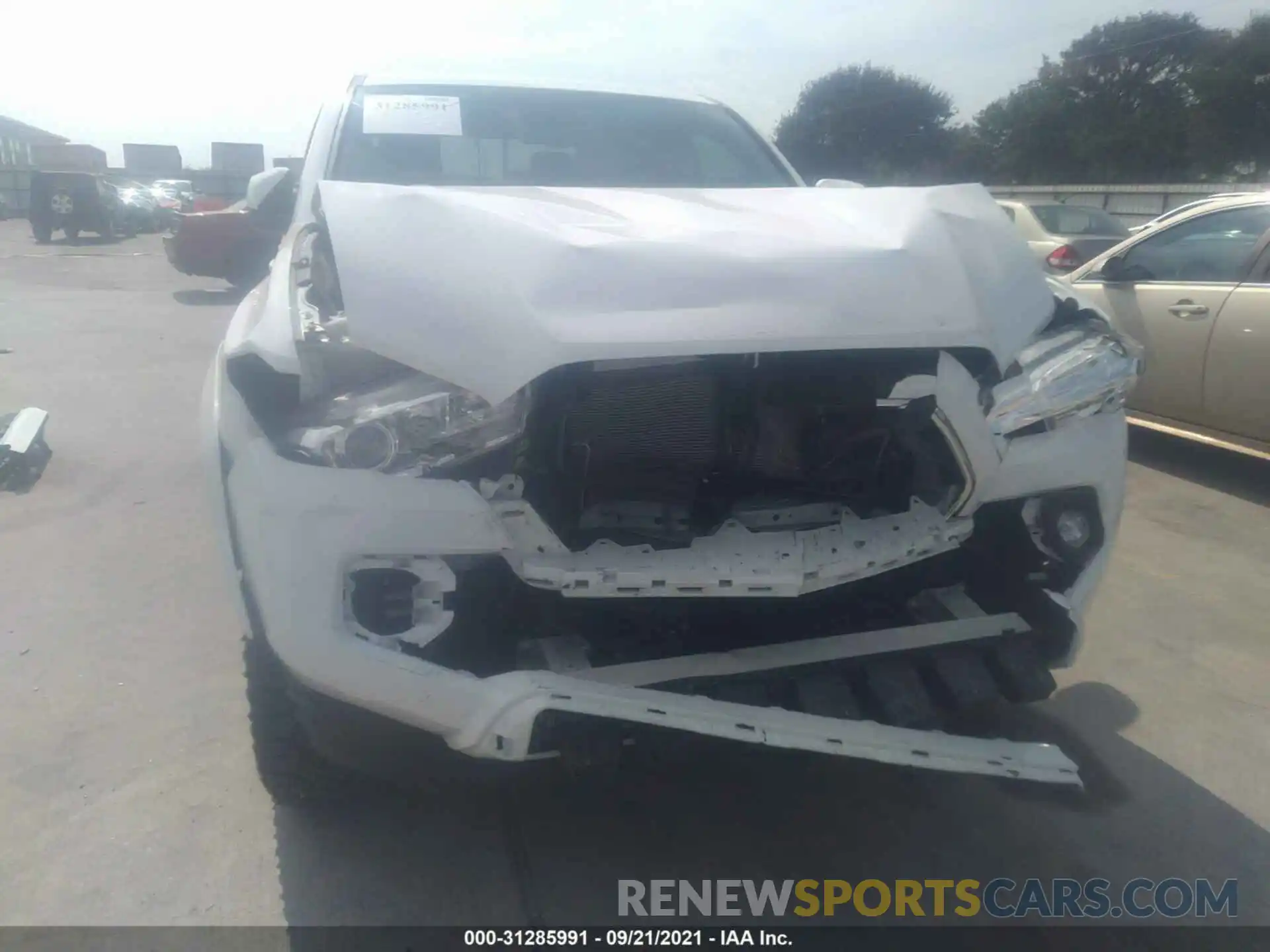 6 Photograph of a damaged car 5TFAZ5CN6MX108683 TOYOTA TACOMA 2WD 2021