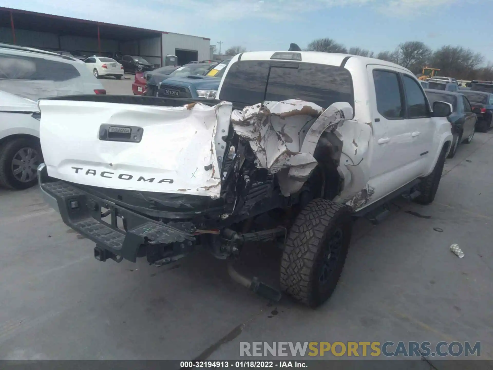 4 Photograph of a damaged car 5TFAZ5CN7MX102522 TOYOTA TACOMA 2WD 2021