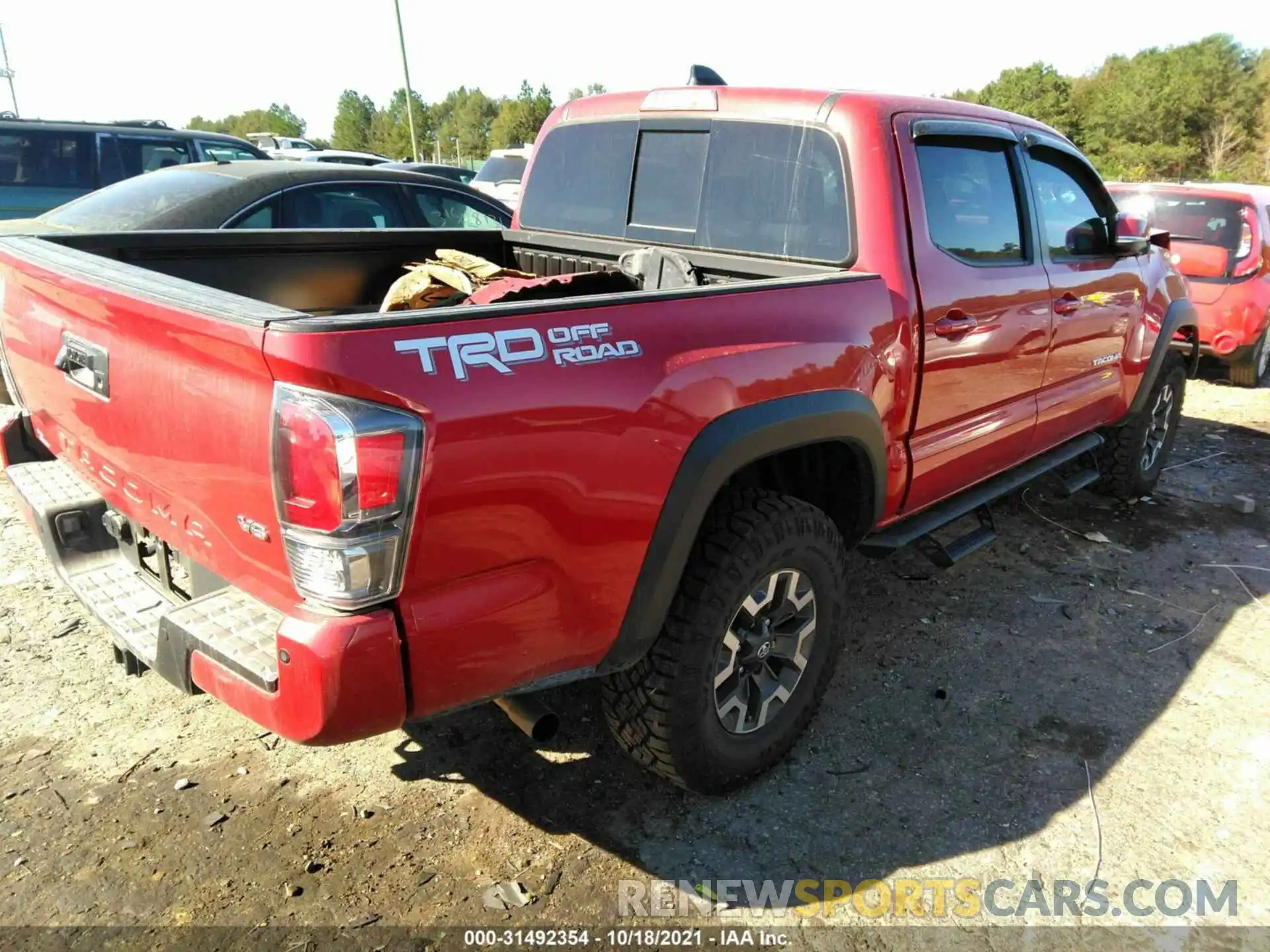 4 Photograph of a damaged car 5TFAZ5CN8MX102920 TOYOTA TACOMA 2WD 2021