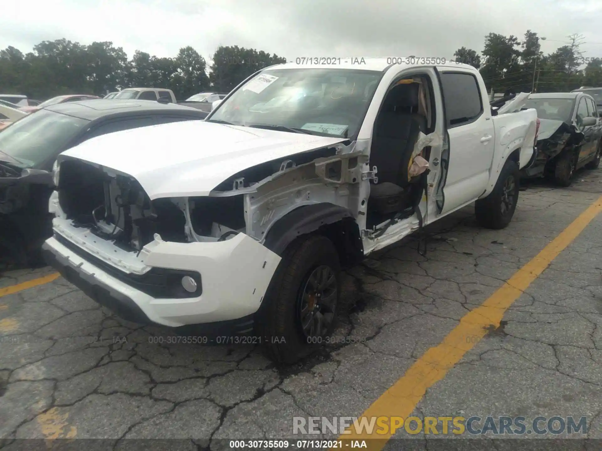 2 Photograph of a damaged car 5TFAZ5CN8MX107969 TOYOTA TACOMA 2WD 2021