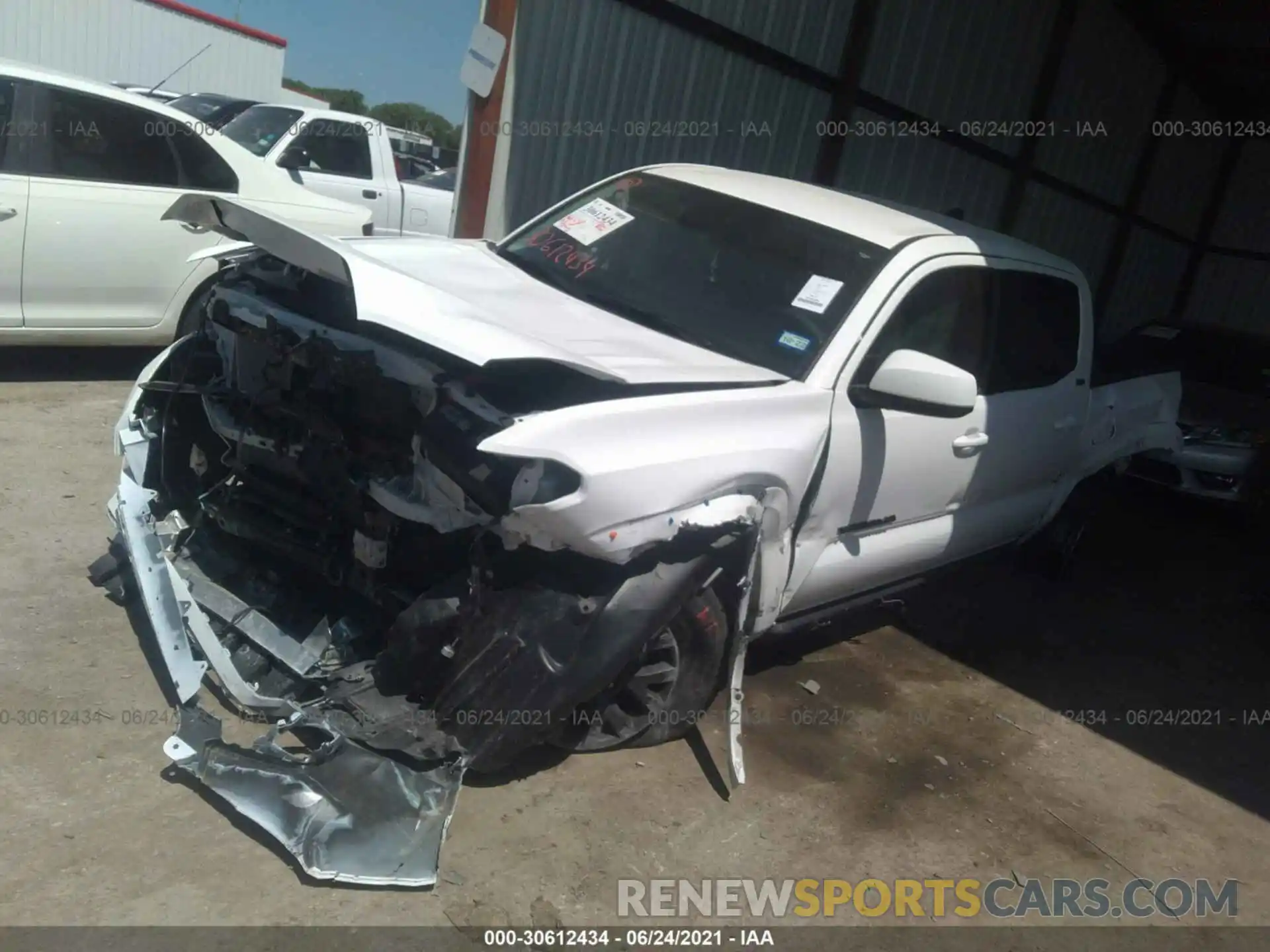 2 Photograph of a damaged car 5TFAZ5CN9MX096903 TOYOTA TACOMA 2WD 2021