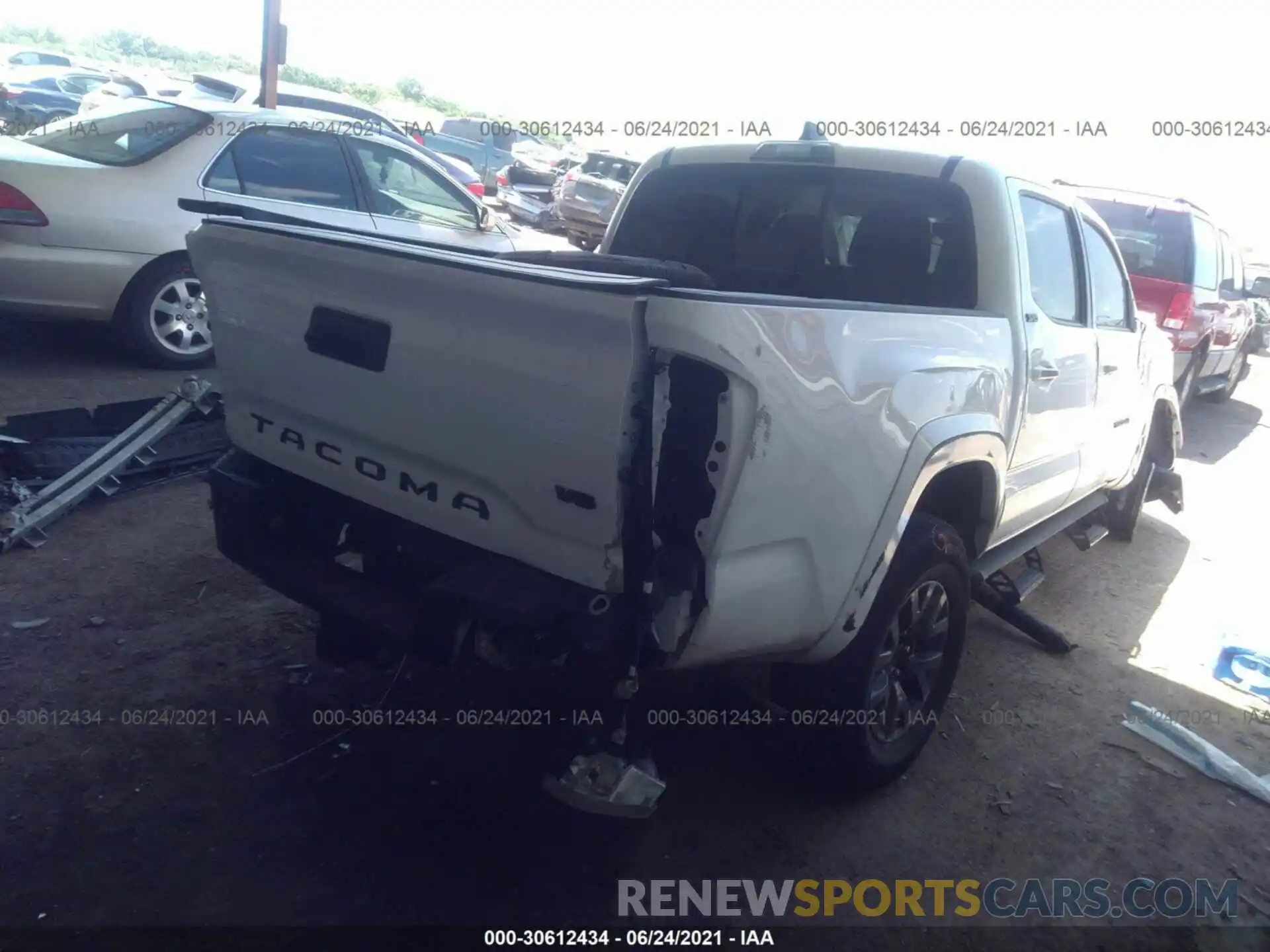 4 Photograph of a damaged car 5TFAZ5CN9MX096903 TOYOTA TACOMA 2WD 2021