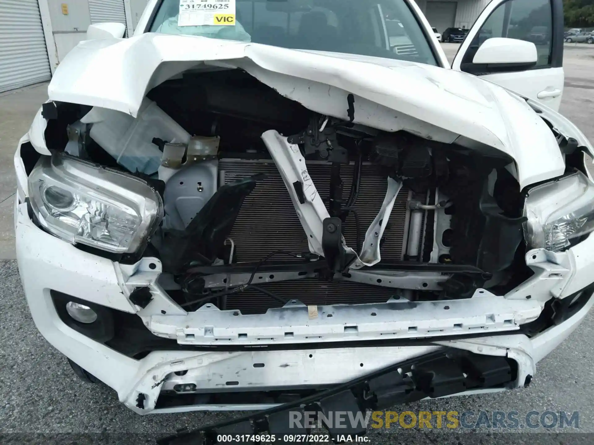 6 Photograph of a damaged car 5TFAZ5CN9MX099770 TOYOTA TACOMA 2WD 2021