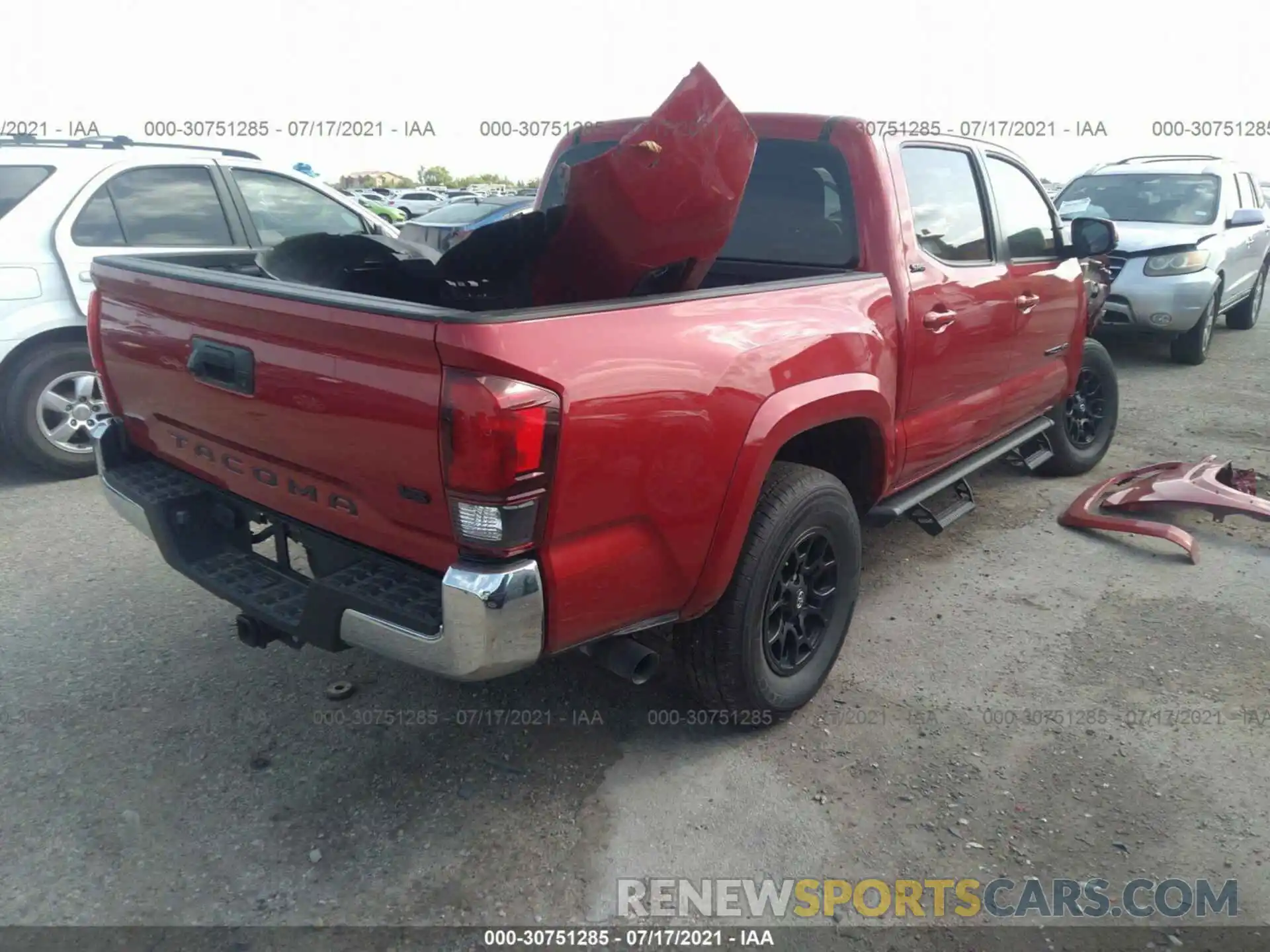 4 Photograph of a damaged car 5TFAZ5CN9MX099946 TOYOTA TACOMA 2WD 2021