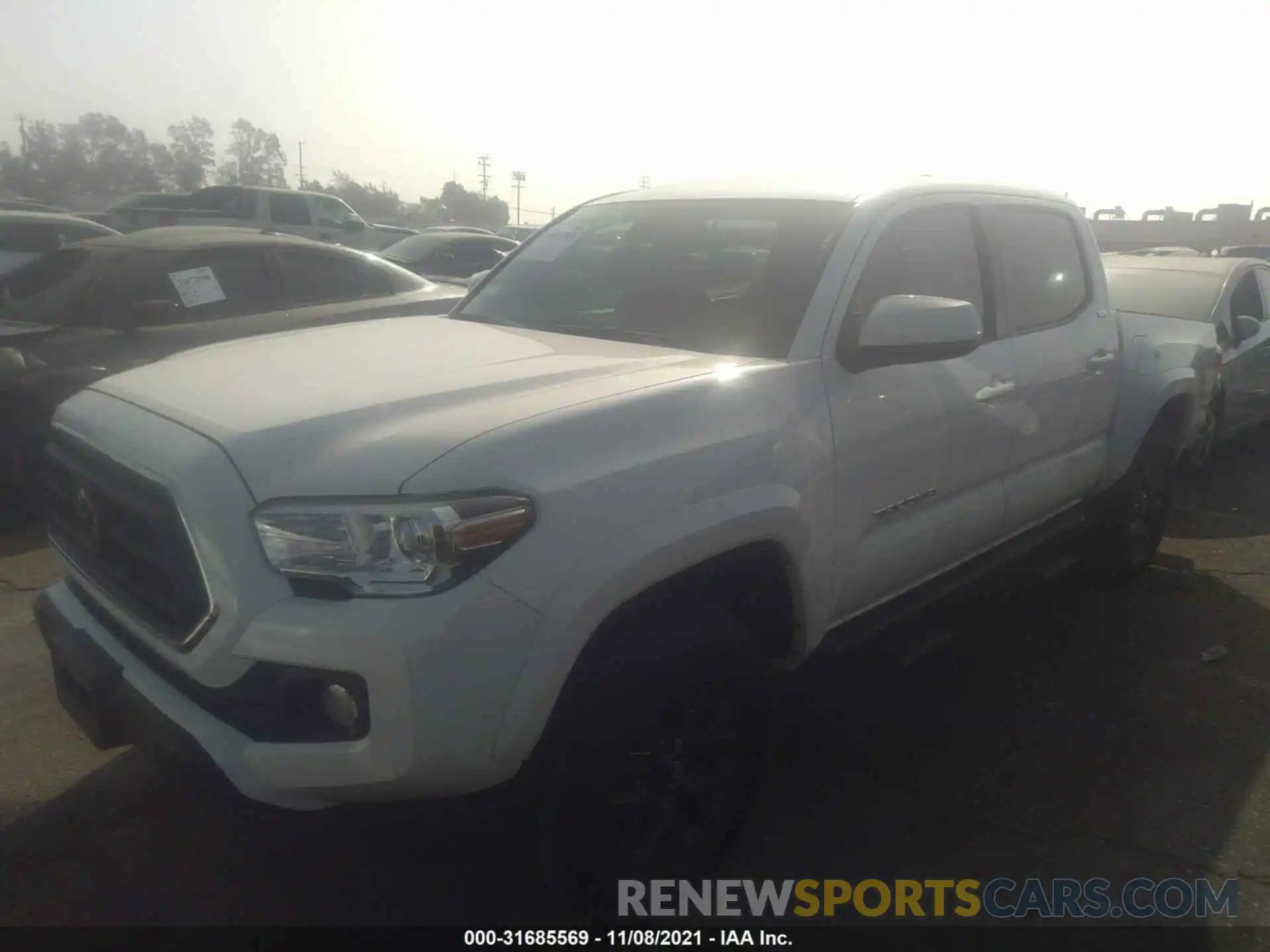 2 Photograph of a damaged car 5TFAZ5CN9MX101937 TOYOTA TACOMA 2WD 2021