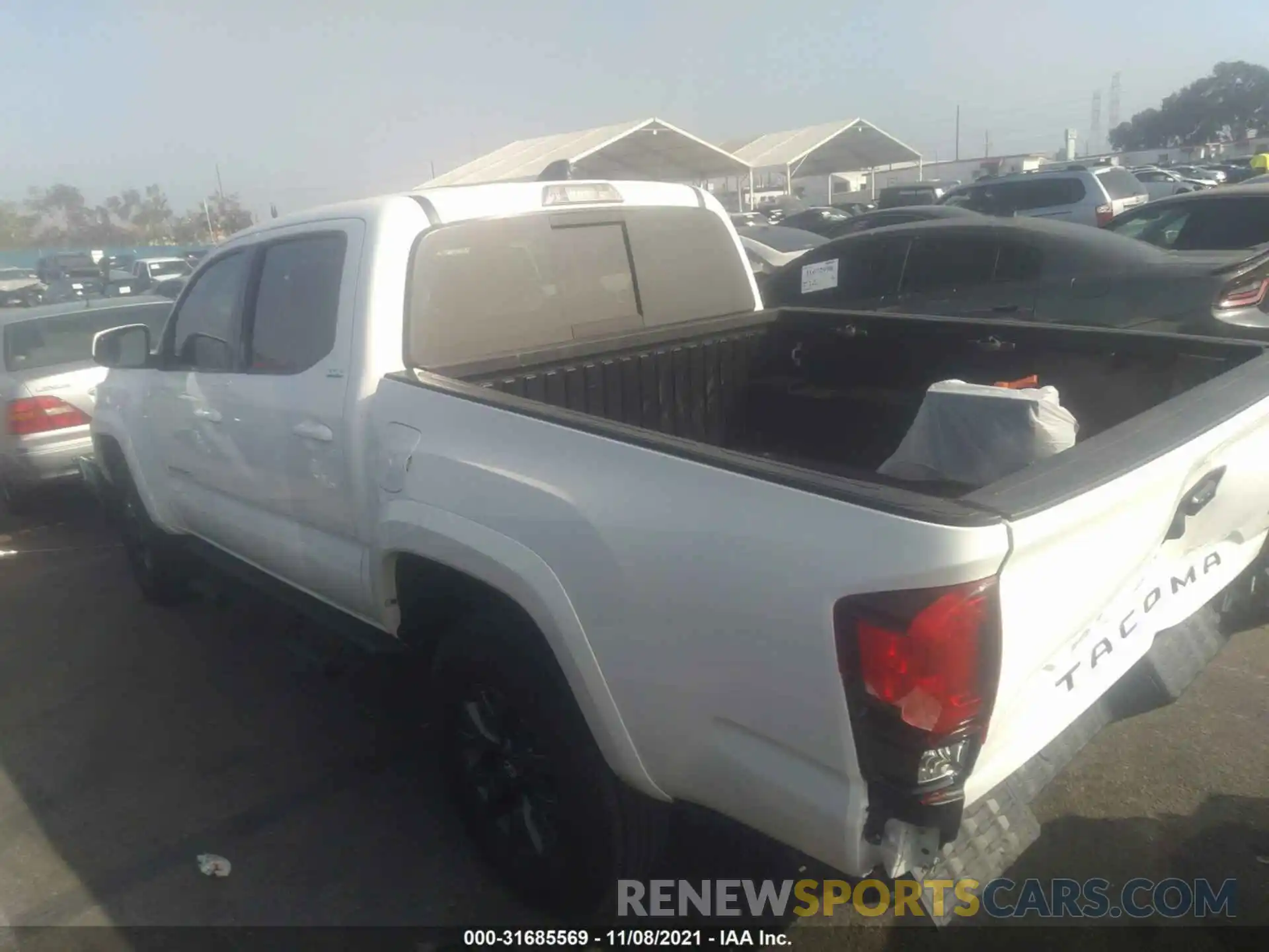 3 Photograph of a damaged car 5TFAZ5CN9MX101937 TOYOTA TACOMA 2WD 2021