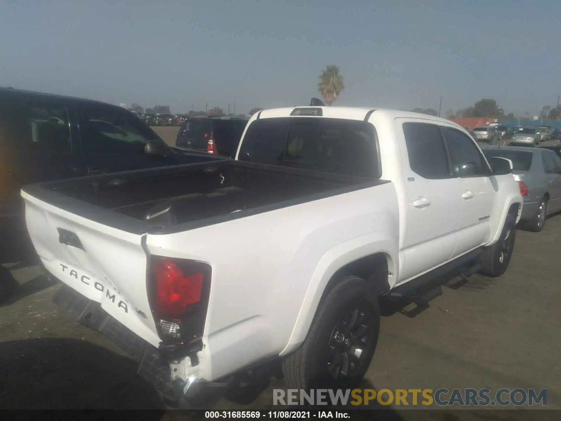 4 Photograph of a damaged car 5TFAZ5CN9MX101937 TOYOTA TACOMA 2WD 2021