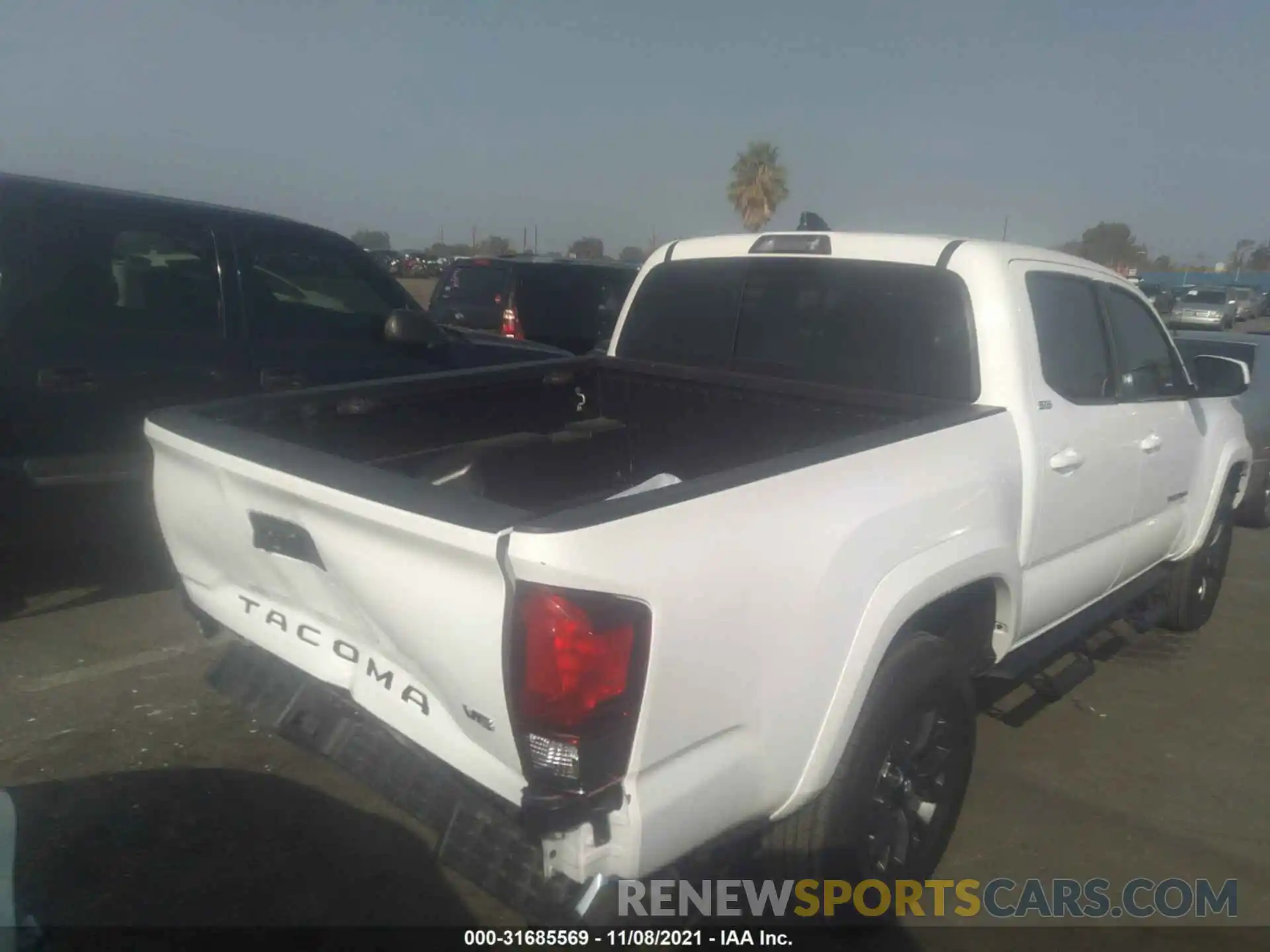 6 Photograph of a damaged car 5TFAZ5CN9MX101937 TOYOTA TACOMA 2WD 2021