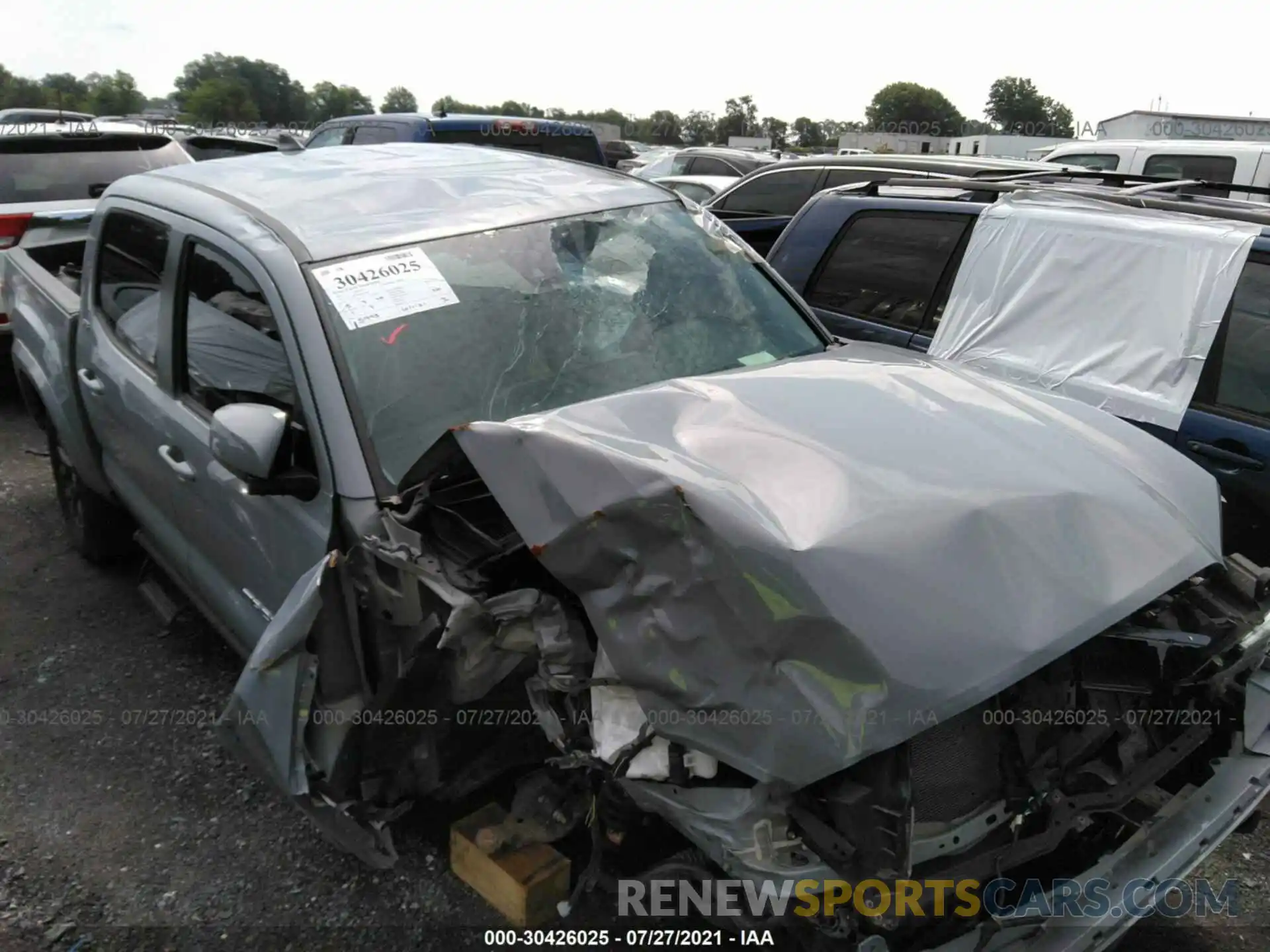 6 Photograph of a damaged car 5TFAZ5CN9MX104109 TOYOTA TACOMA 2WD 2021