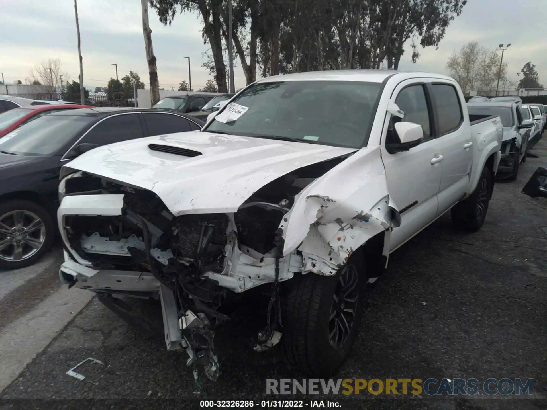 2 Photograph of a damaged car 5TFAZ5CN9MX111299 TOYOTA TACOMA 2WD 2021