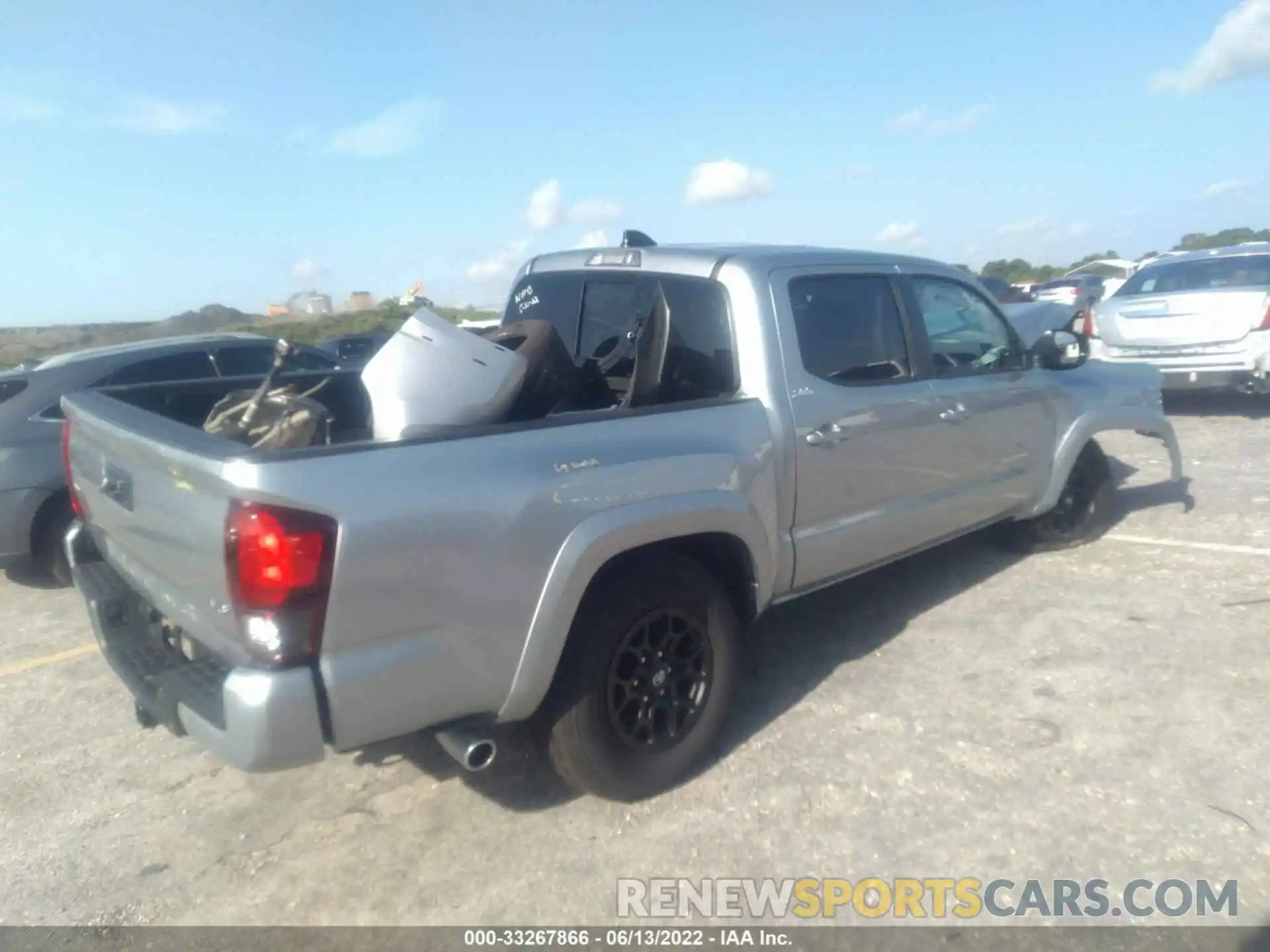 4 Photograph of a damaged car 3TMAZ5CN1NM179541 TOYOTA TACOMA 2WD 2022