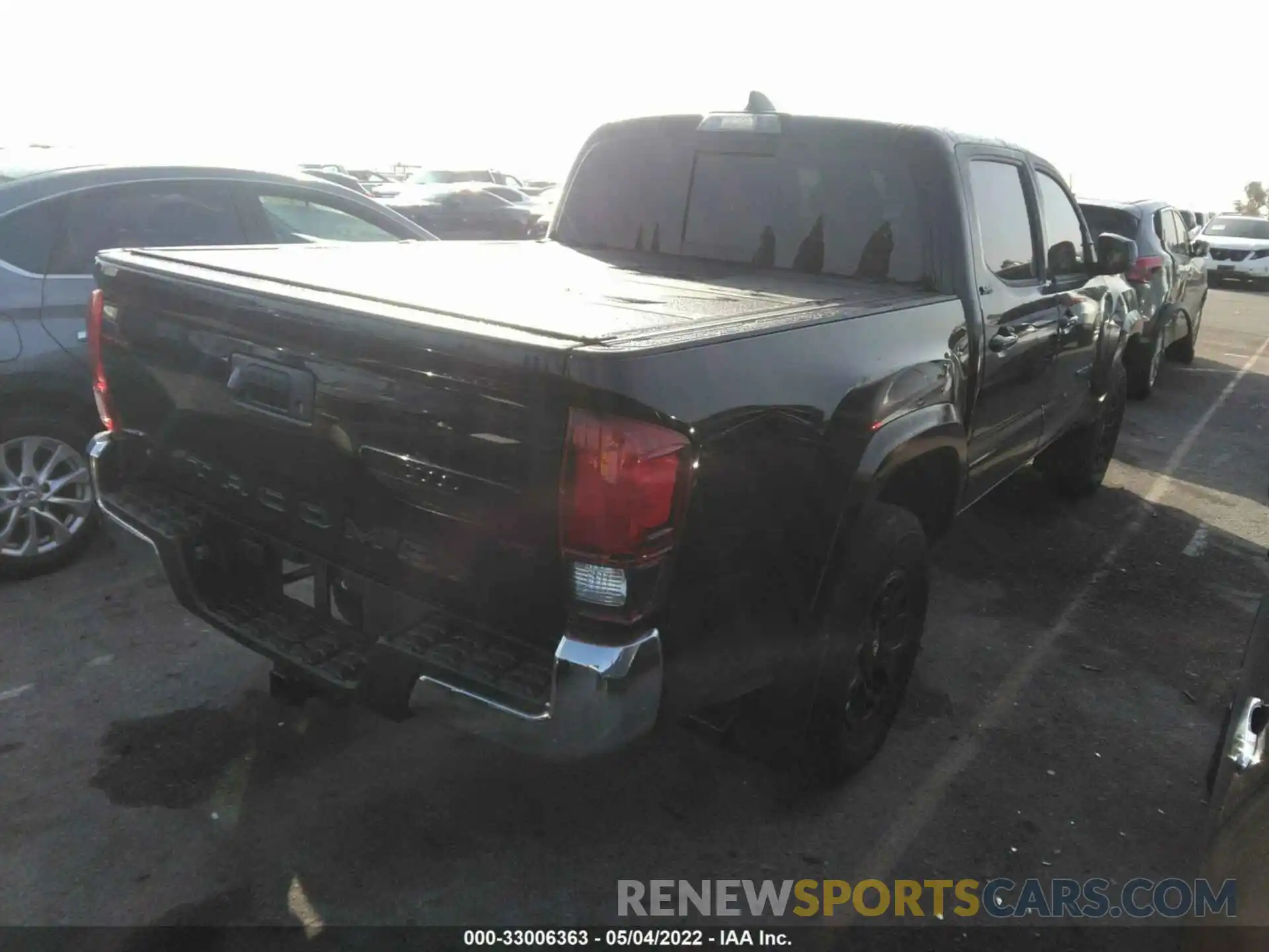 4 Photograph of a damaged car 3TMAZ5CN6NM171841 TOYOTA TACOMA 2WD 2022