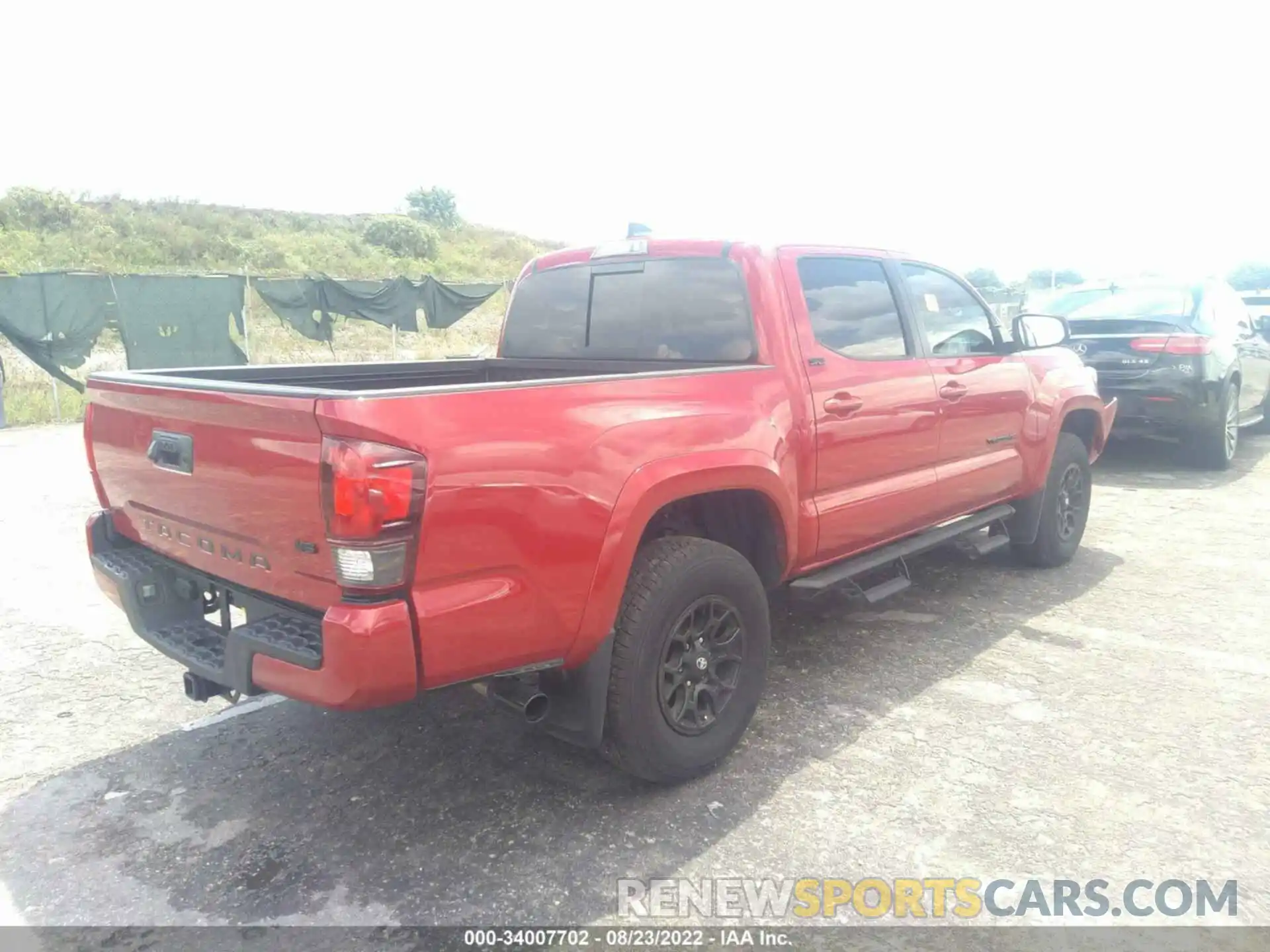 4 Photograph of a damaged car 3TMAZ5CN8NM181139 TOYOTA TACOMA 2WD 2022