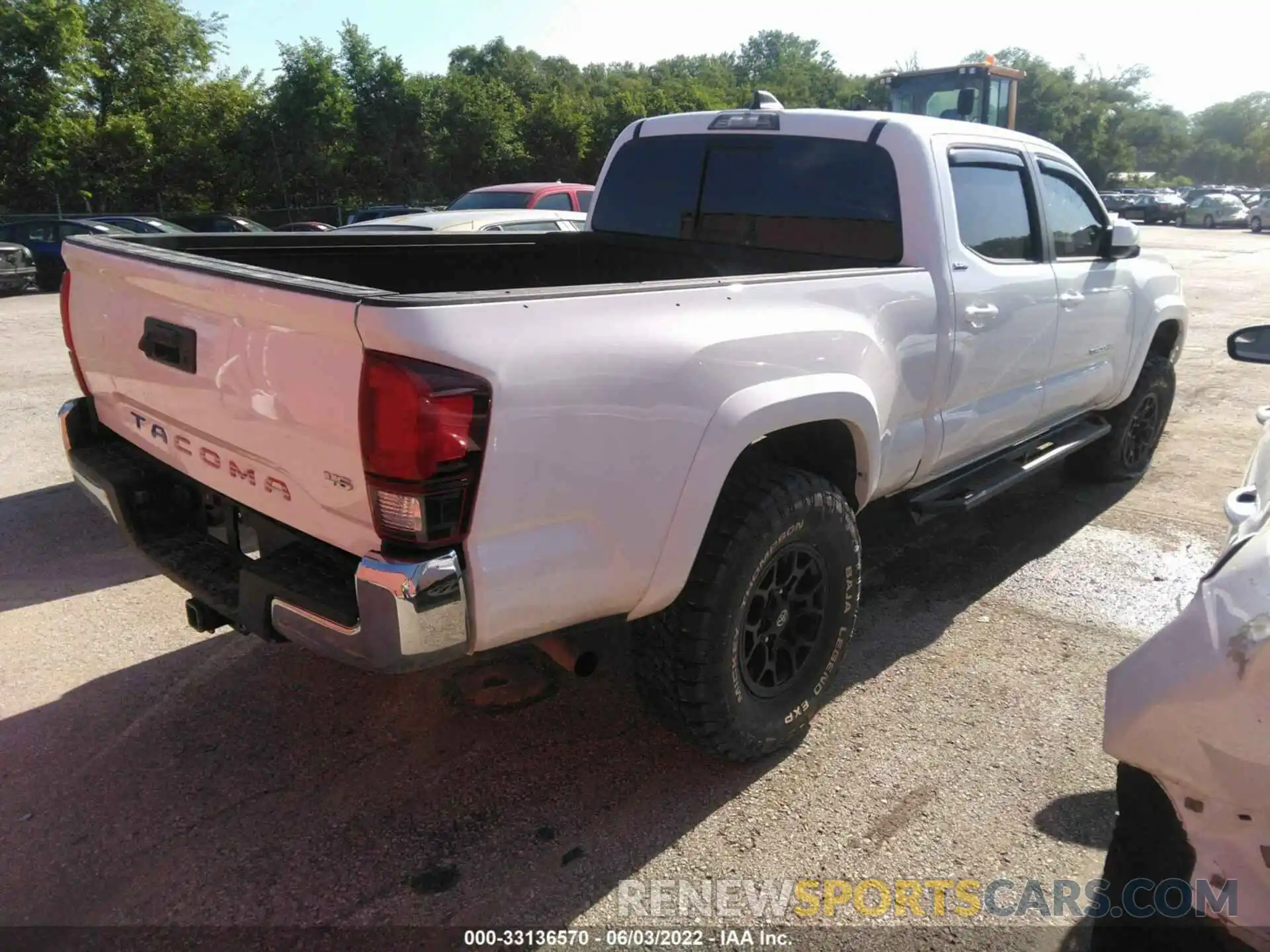 4 Photograph of a damaged car 3TMBZ5DN9NM032385 TOYOTA TACOMA 2WD 2022