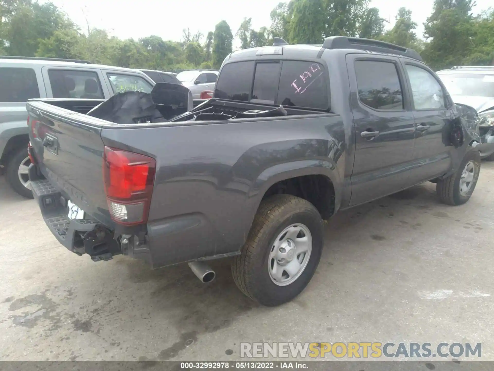 4 Photograph of a damaged car 3TYAX5GN7NT034461 TOYOTA TACOMA 2WD 2022