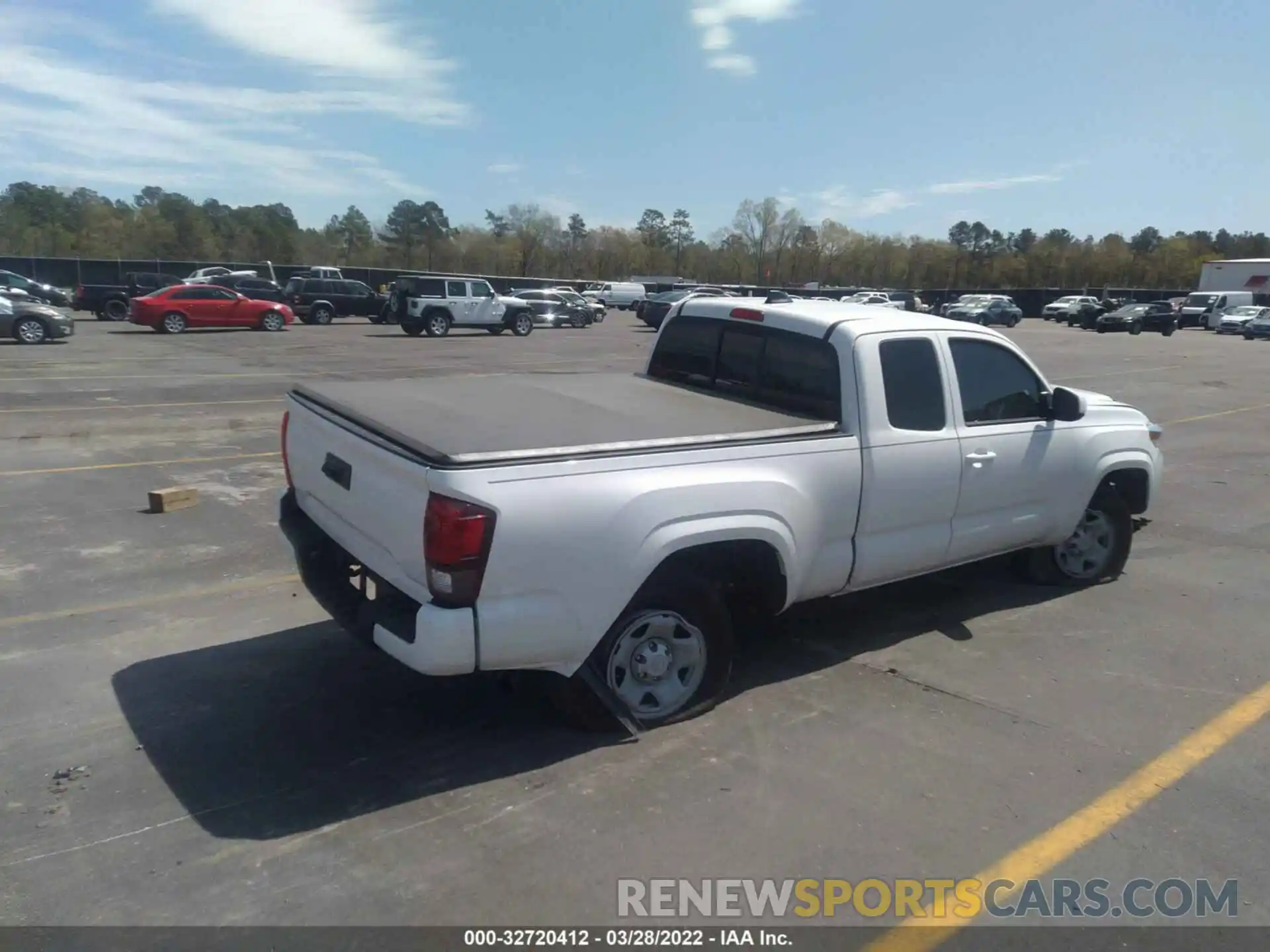 4 Photograph of a damaged car 3TYRX5GN9NT038241 TOYOTA TACOMA 2WD 2022