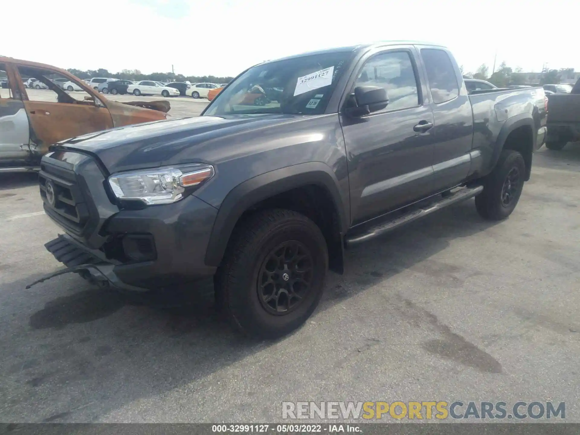 2 Photograph of a damaged car 3TYRZ5CN0NT014457 TOYOTA TACOMA 2WD 2022