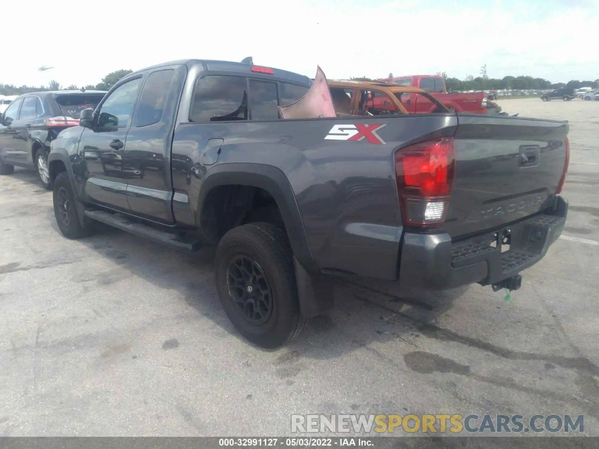 3 Photograph of a damaged car 3TYRZ5CN0NT014457 TOYOTA TACOMA 2WD 2022