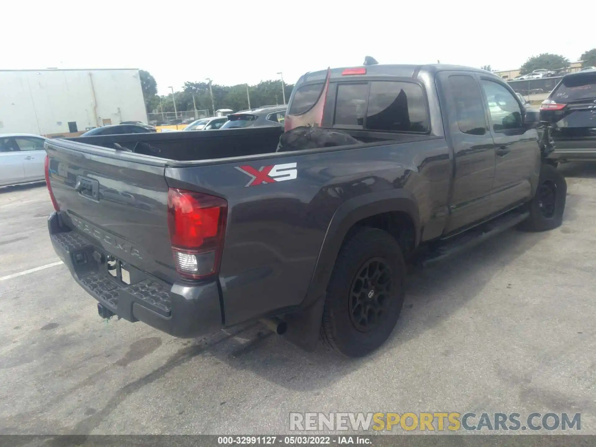 4 Photograph of a damaged car 3TYRZ5CN0NT014457 TOYOTA TACOMA 2WD 2022