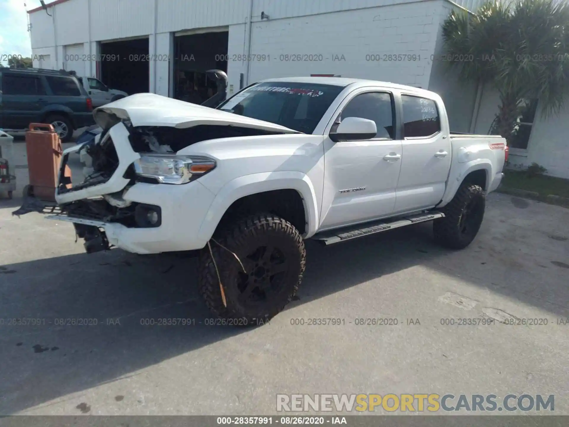 2 Photograph of a damaged car 3TMCZ5AN0KM194555 TOYOTA TACOMA 4WD 2019