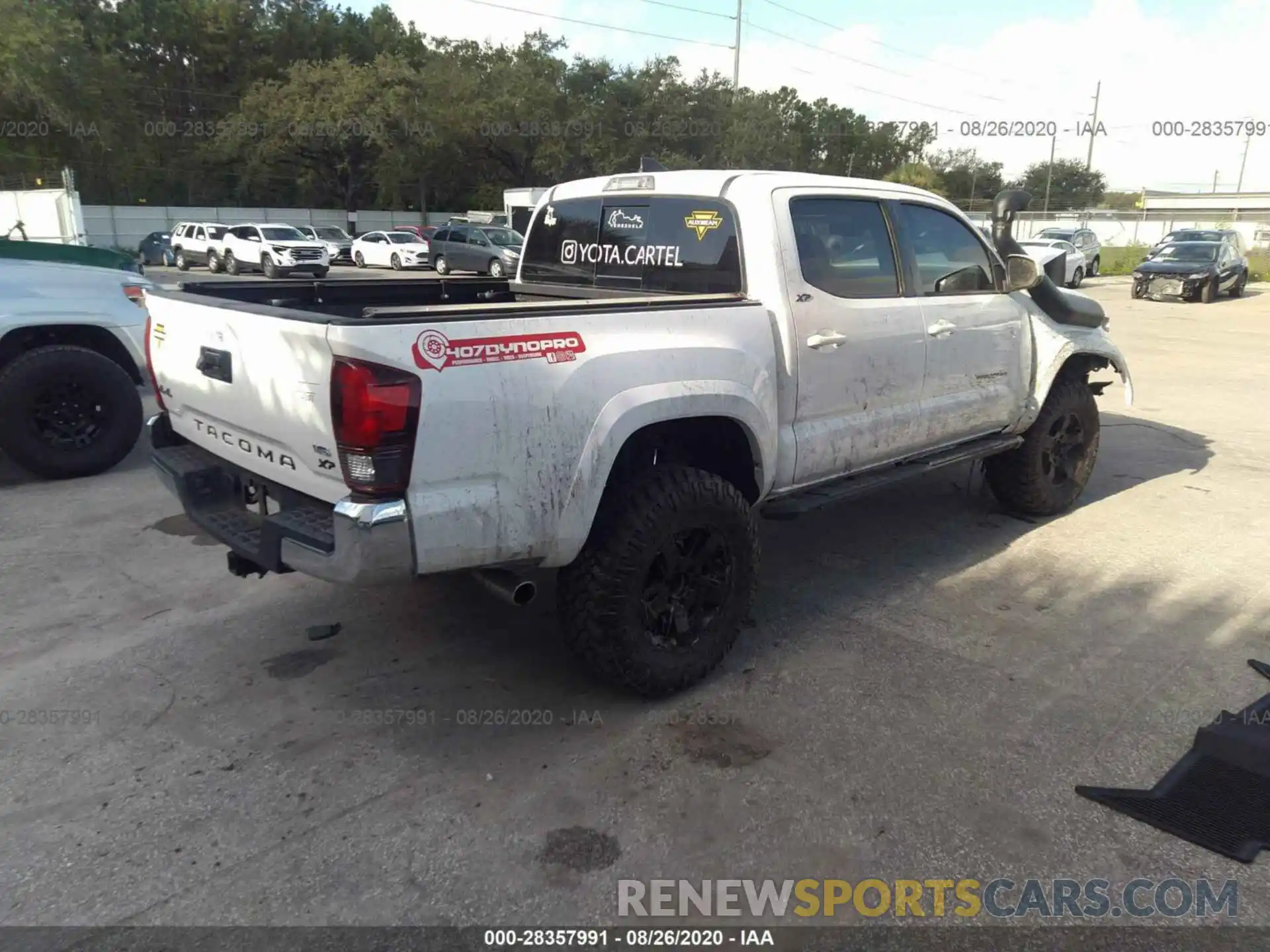 4 Photograph of a damaged car 3TMCZ5AN0KM194555 TOYOTA TACOMA 4WD 2019