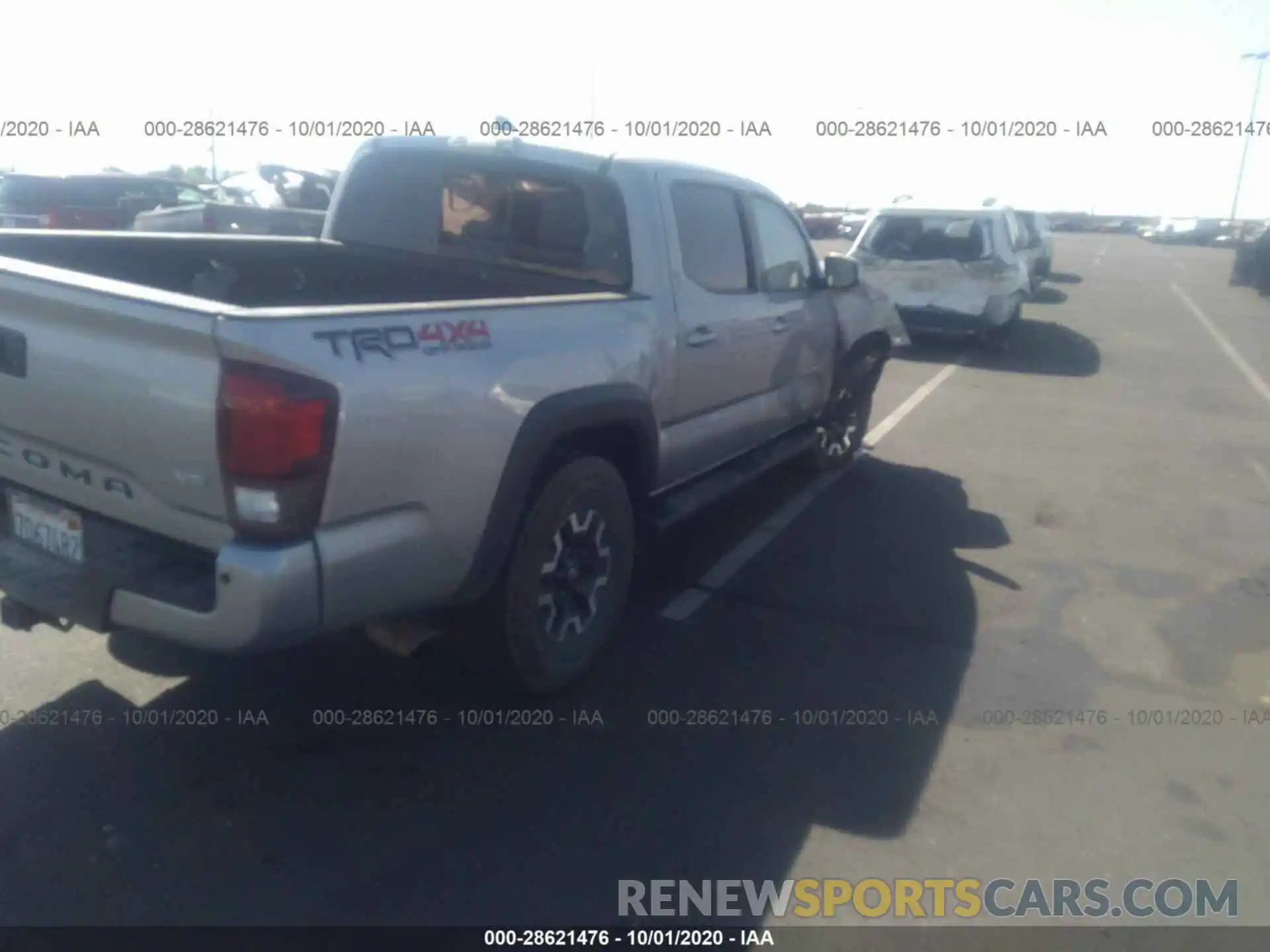 4 Photograph of a damaged car 3TMCZ5AN0KM194975 TOYOTA TACOMA 4WD 2019