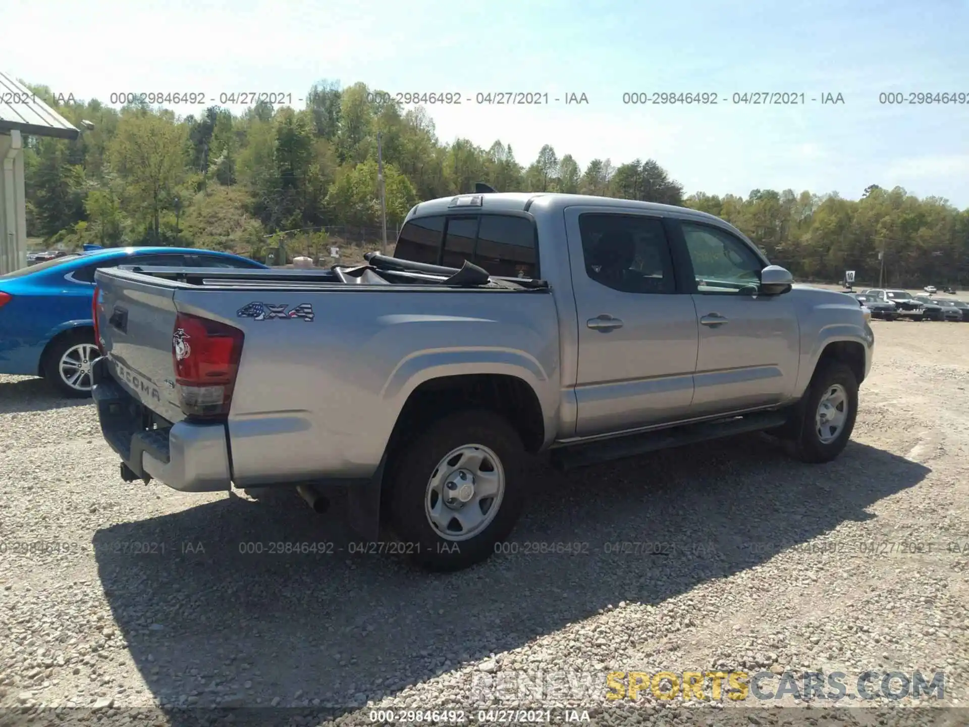 4 Photograph of a damaged car 3TMCZ5AN0KM201620 TOYOTA TACOMA 4WD 2019