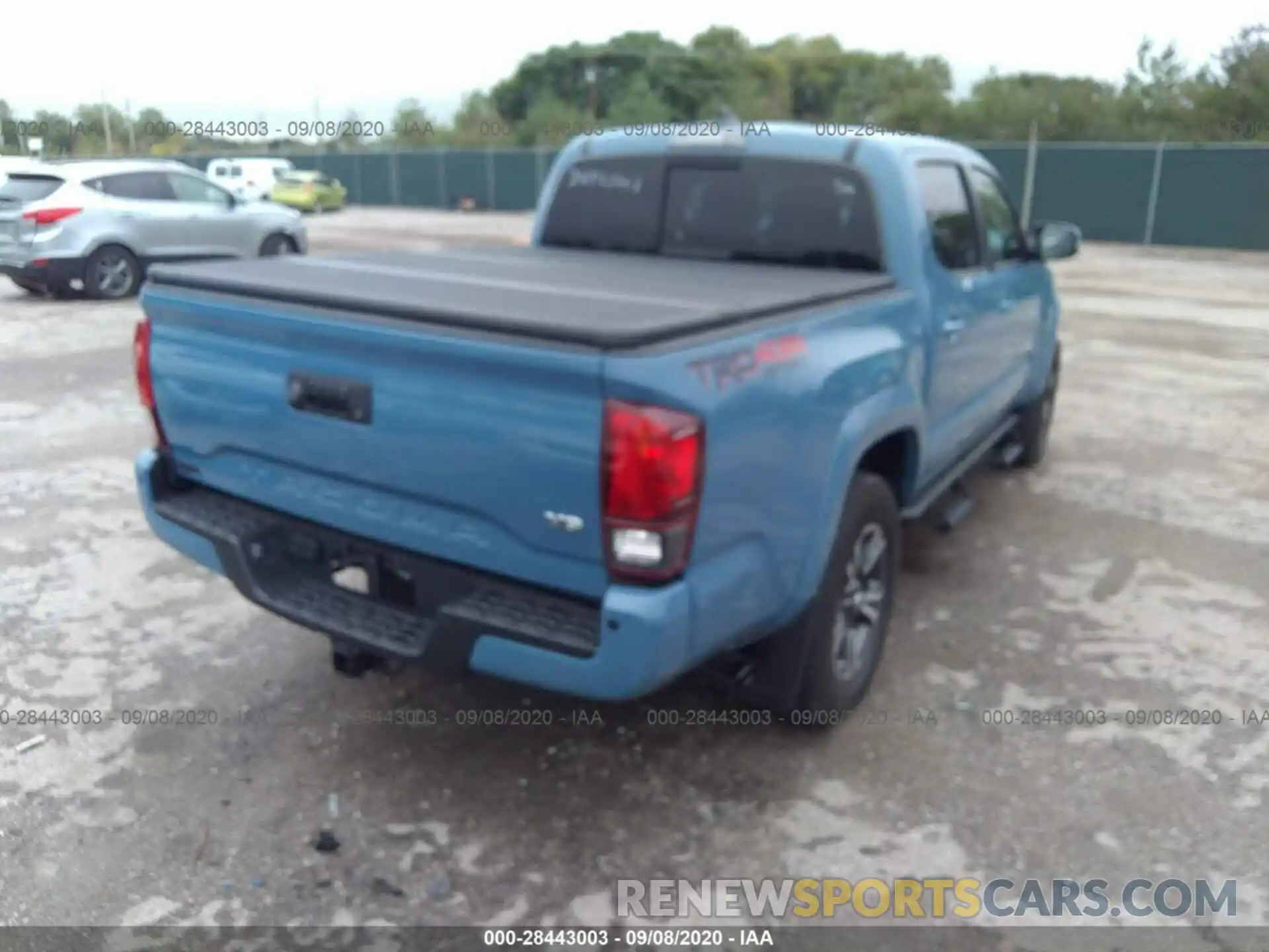 4 Photograph of a damaged car 3TMCZ5AN0KM201939 TOYOTA TACOMA 4WD 2019