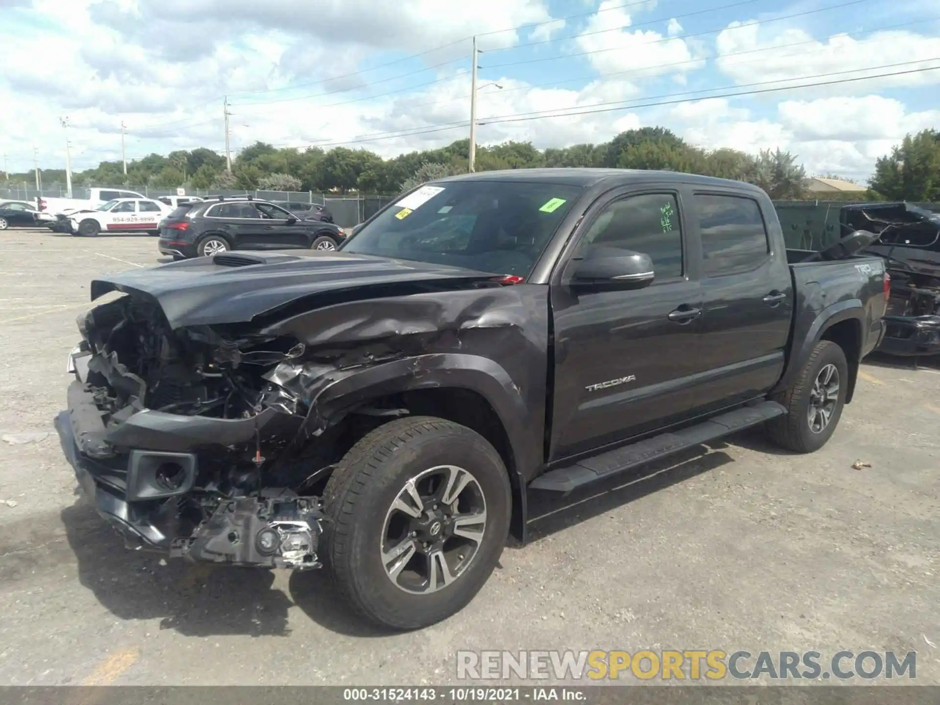 2 Photograph of a damaged car 3TMCZ5AN0KM216912 TOYOTA TACOMA 4WD 2019