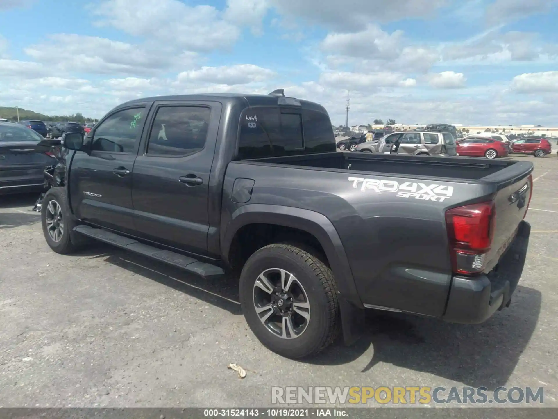 3 Photograph of a damaged car 3TMCZ5AN0KM216912 TOYOTA TACOMA 4WD 2019