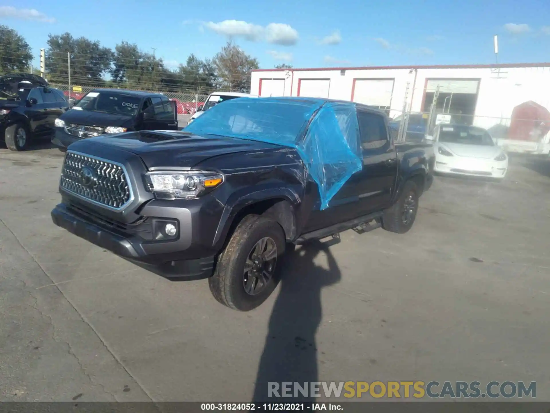 2 Photograph of a damaged car 3TMCZ5AN0KM231183 TOYOTA TACOMA 4WD 2019