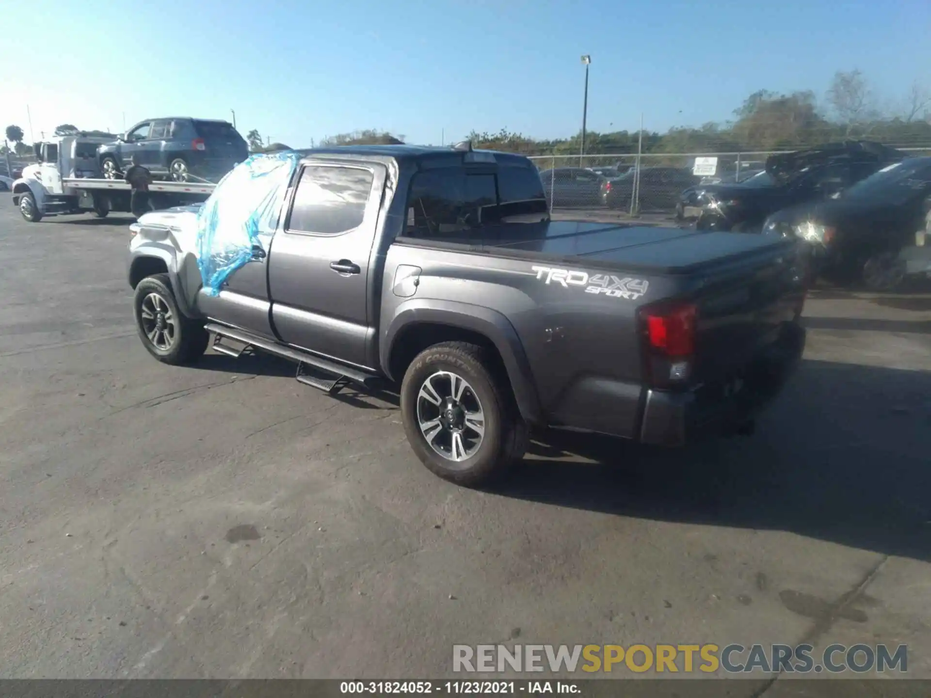 3 Photograph of a damaged car 3TMCZ5AN0KM231183 TOYOTA TACOMA 4WD 2019