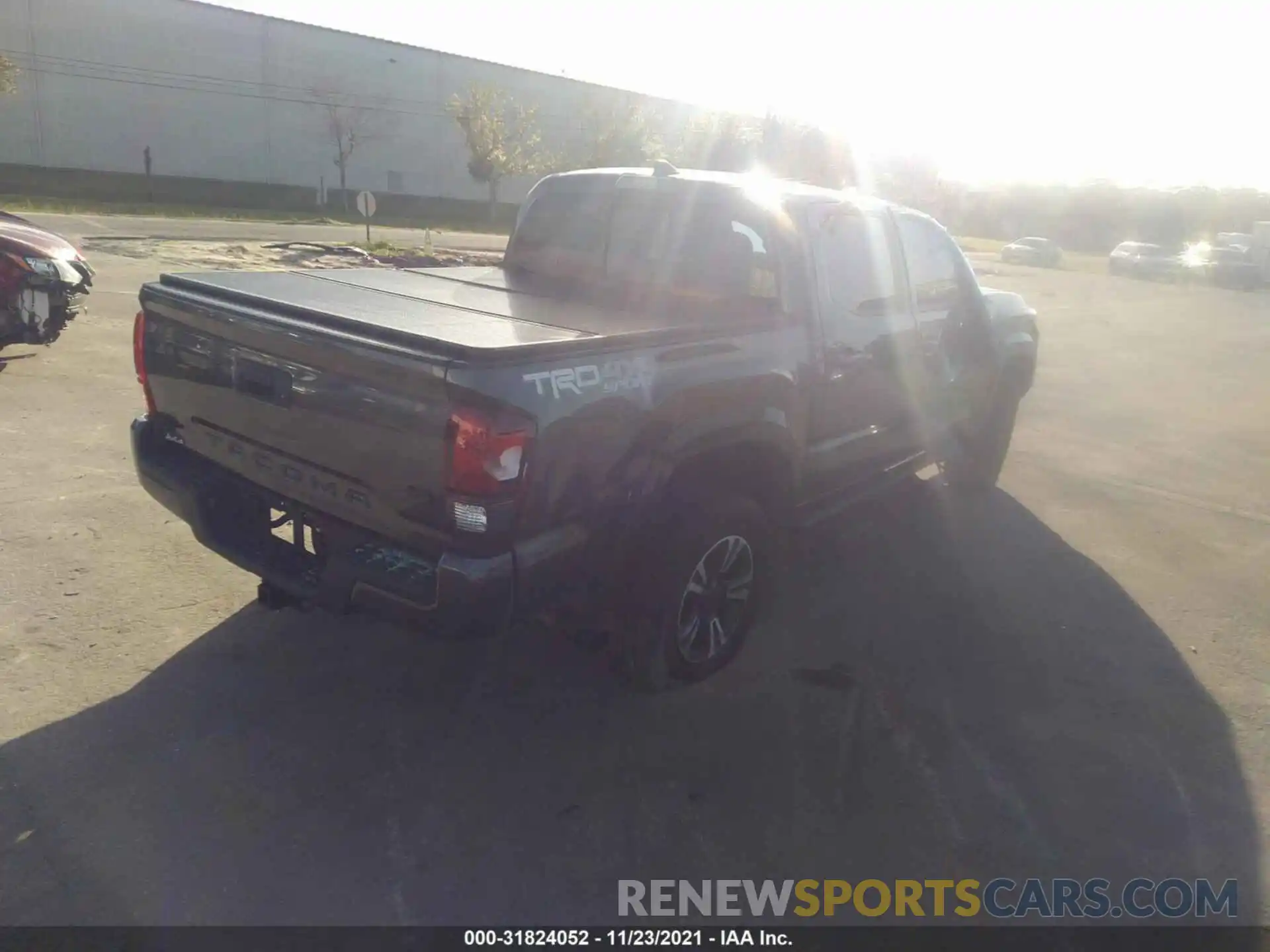 4 Photograph of a damaged car 3TMCZ5AN0KM231183 TOYOTA TACOMA 4WD 2019