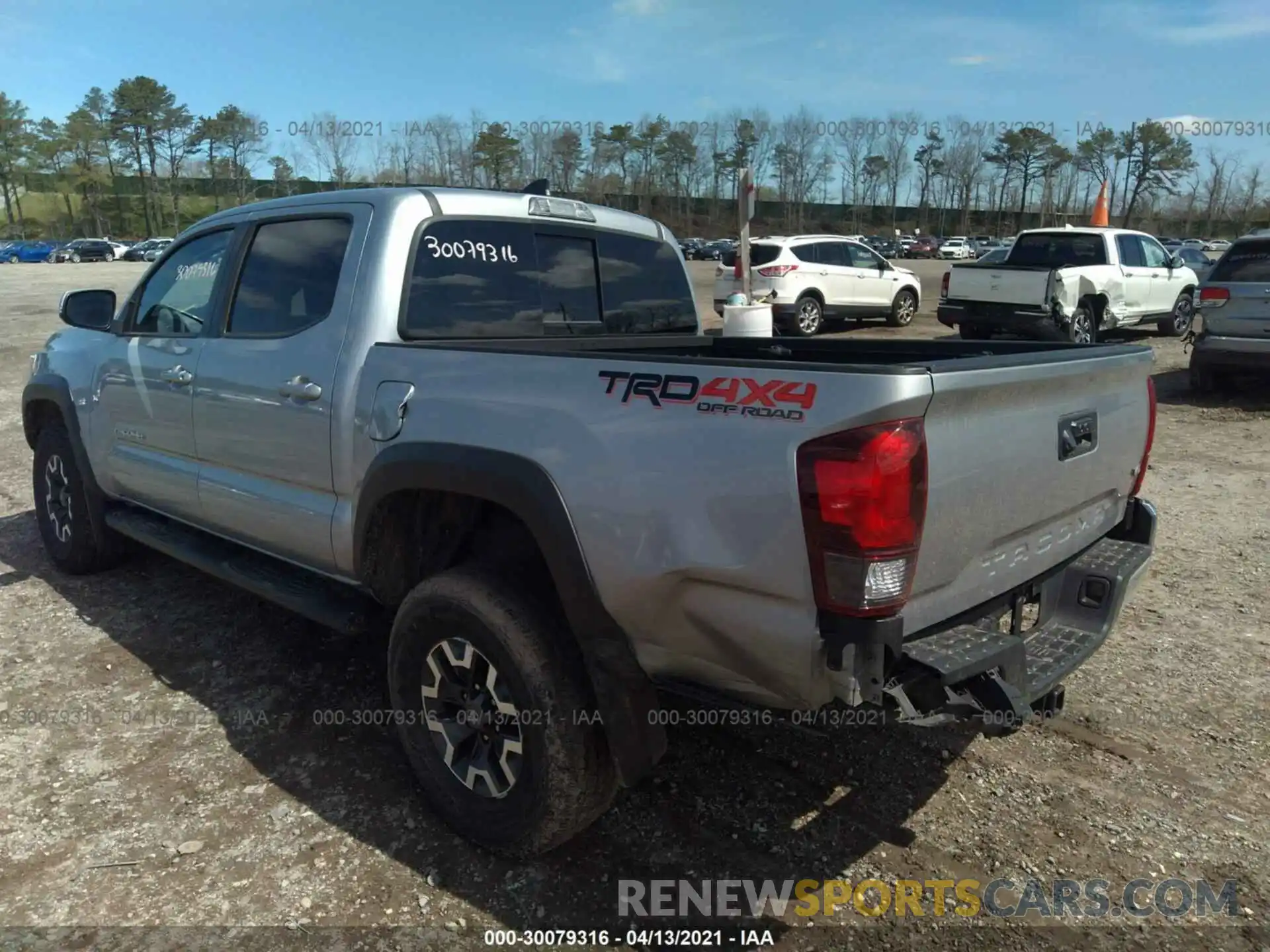 3 Photograph of a damaged car 3TMCZ5AN0KM232656 TOYOTA TACOMA 4WD 2019