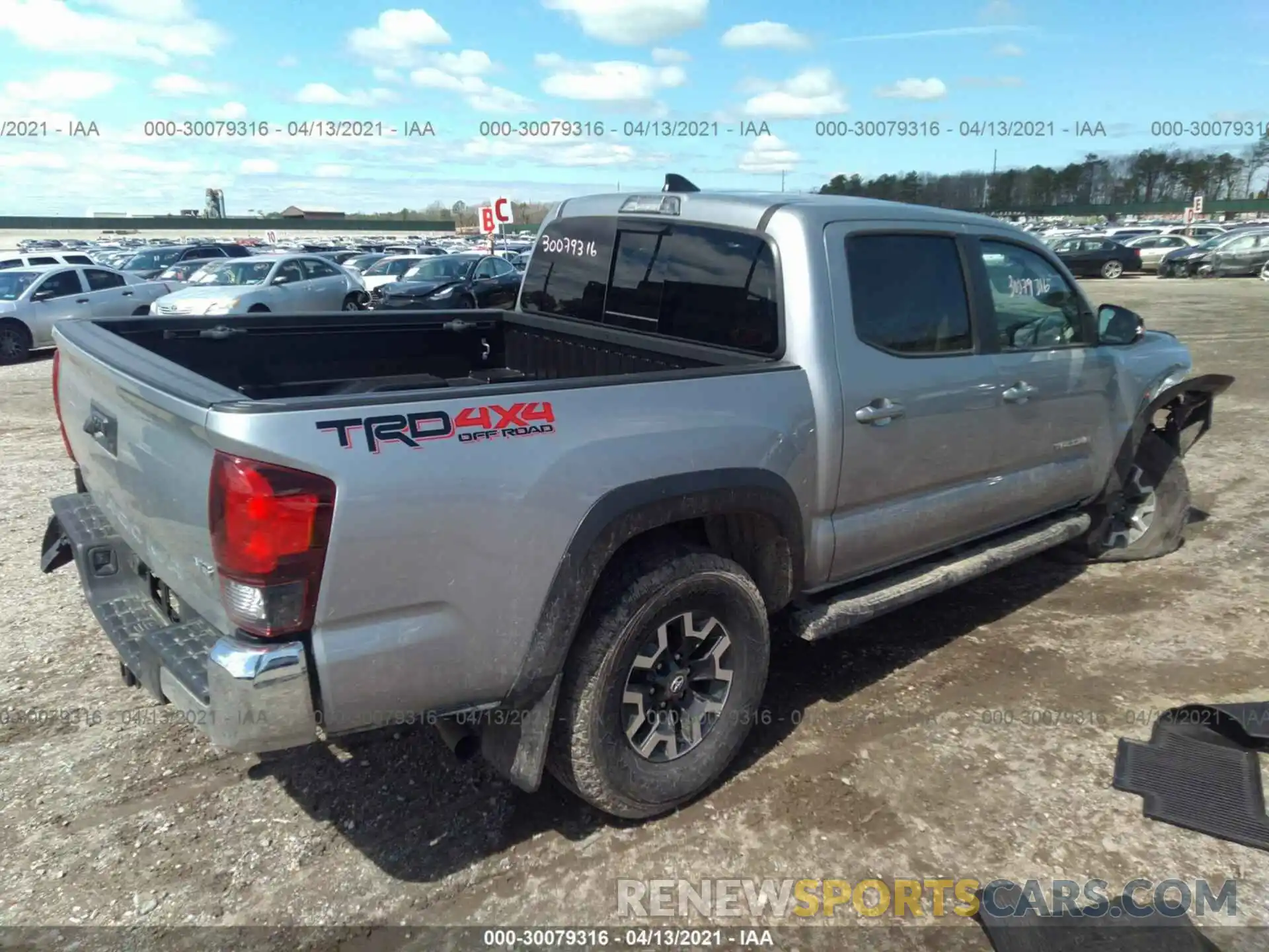 4 Photograph of a damaged car 3TMCZ5AN0KM232656 TOYOTA TACOMA 4WD 2019