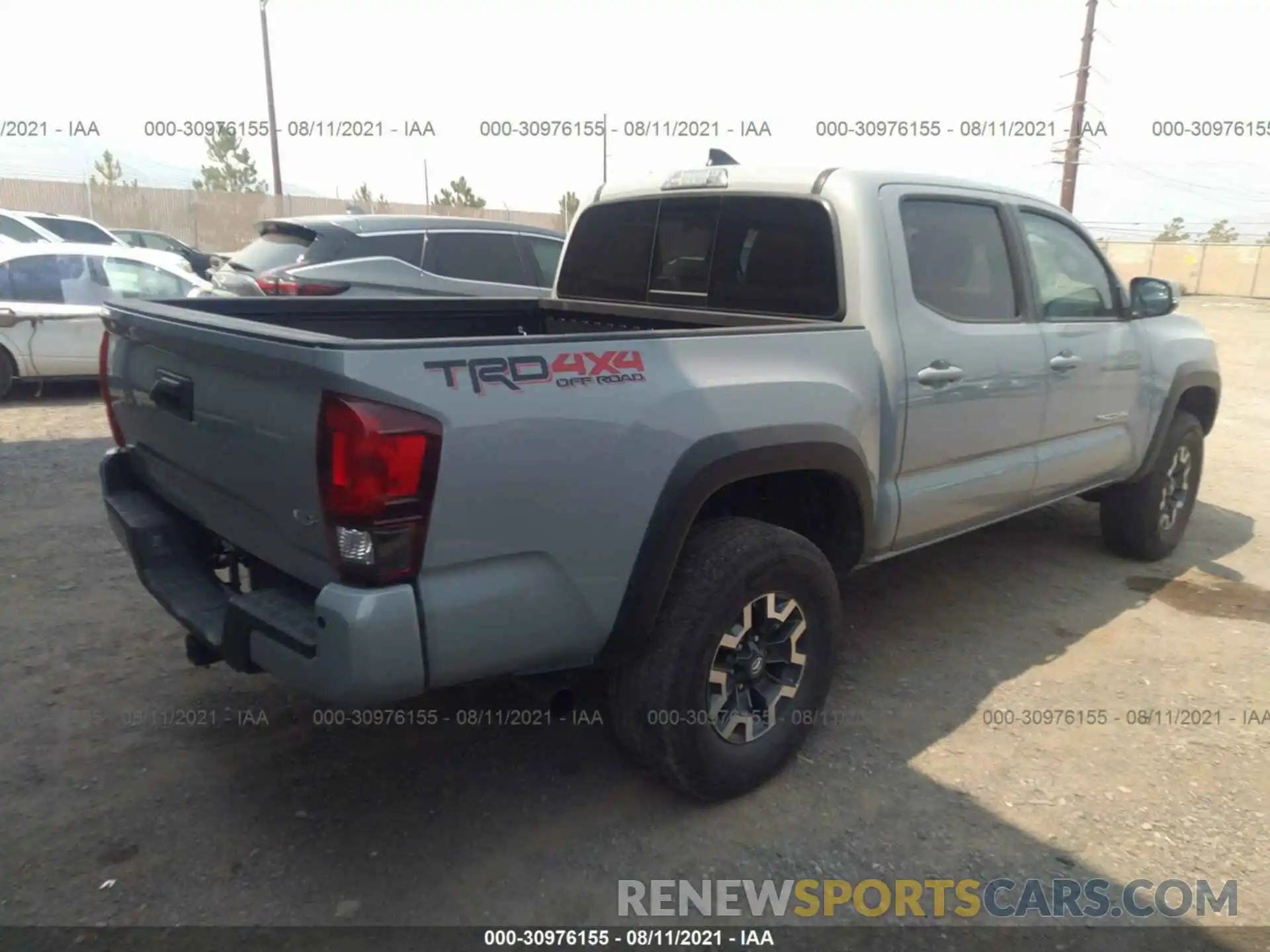 4 Photograph of a damaged car 3TMCZ5AN0KM236979 TOYOTA TACOMA 4WD 2019