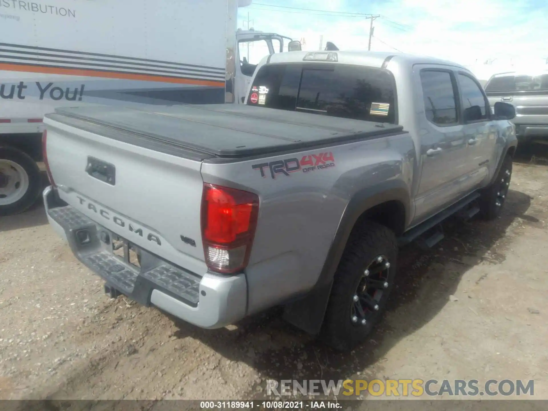 4 Photograph of a damaged car 3TMCZ5AN0KM244855 TOYOTA TACOMA 4WD 2019